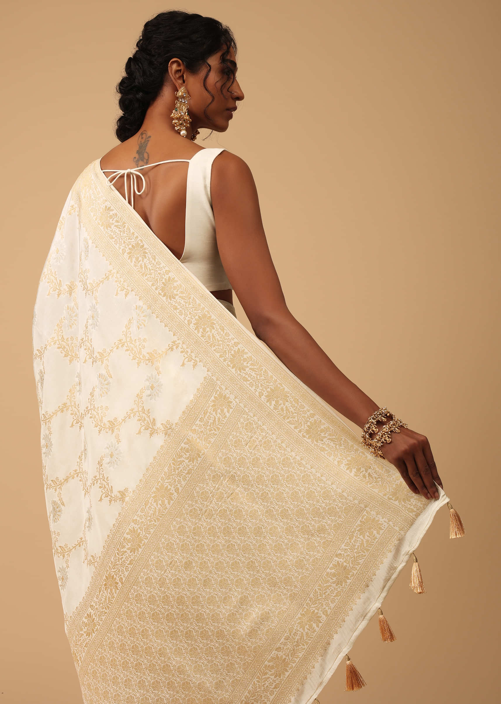 Ivory White Dola Silk Saree With Silver And Gold Jaal Embroidery In Floral Pattern