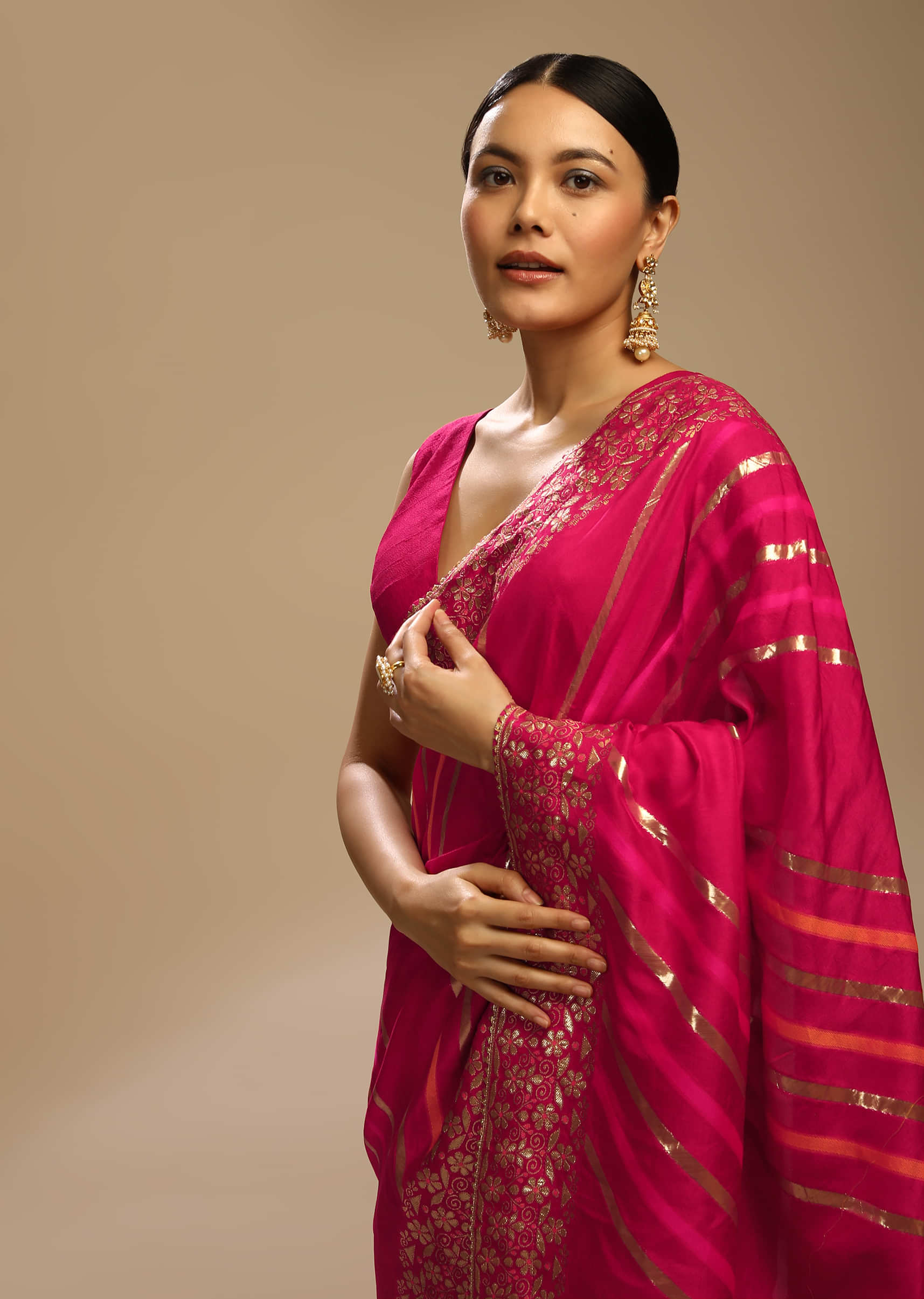 Rani Pink Saree In Dola Silk With Multi Colored Woven Diagonal Stripes And Floral Border