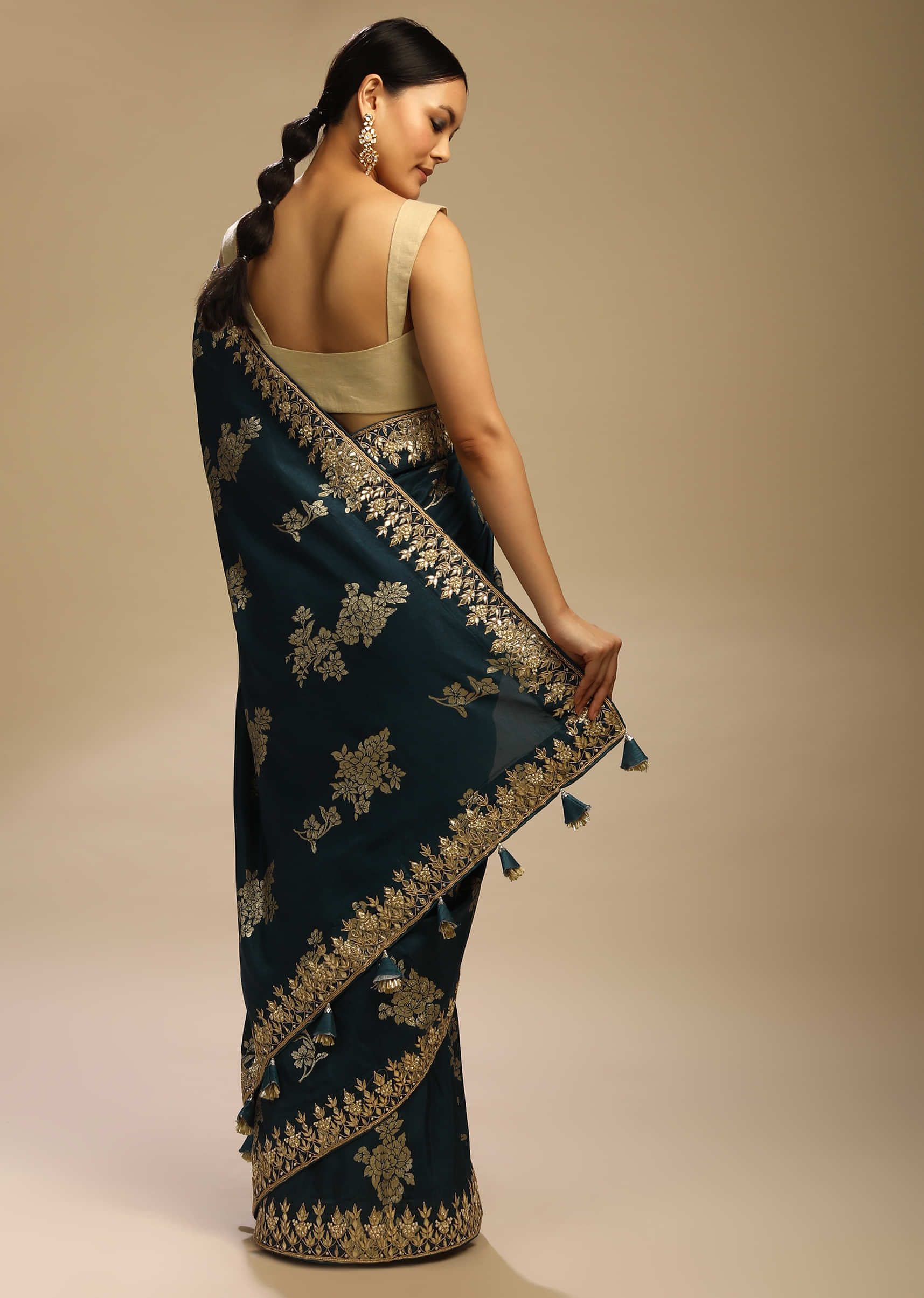 Peacock Blue Saree In Dupion Silk With Woven Floral Motifs And Gotta Embroidered Floral Border