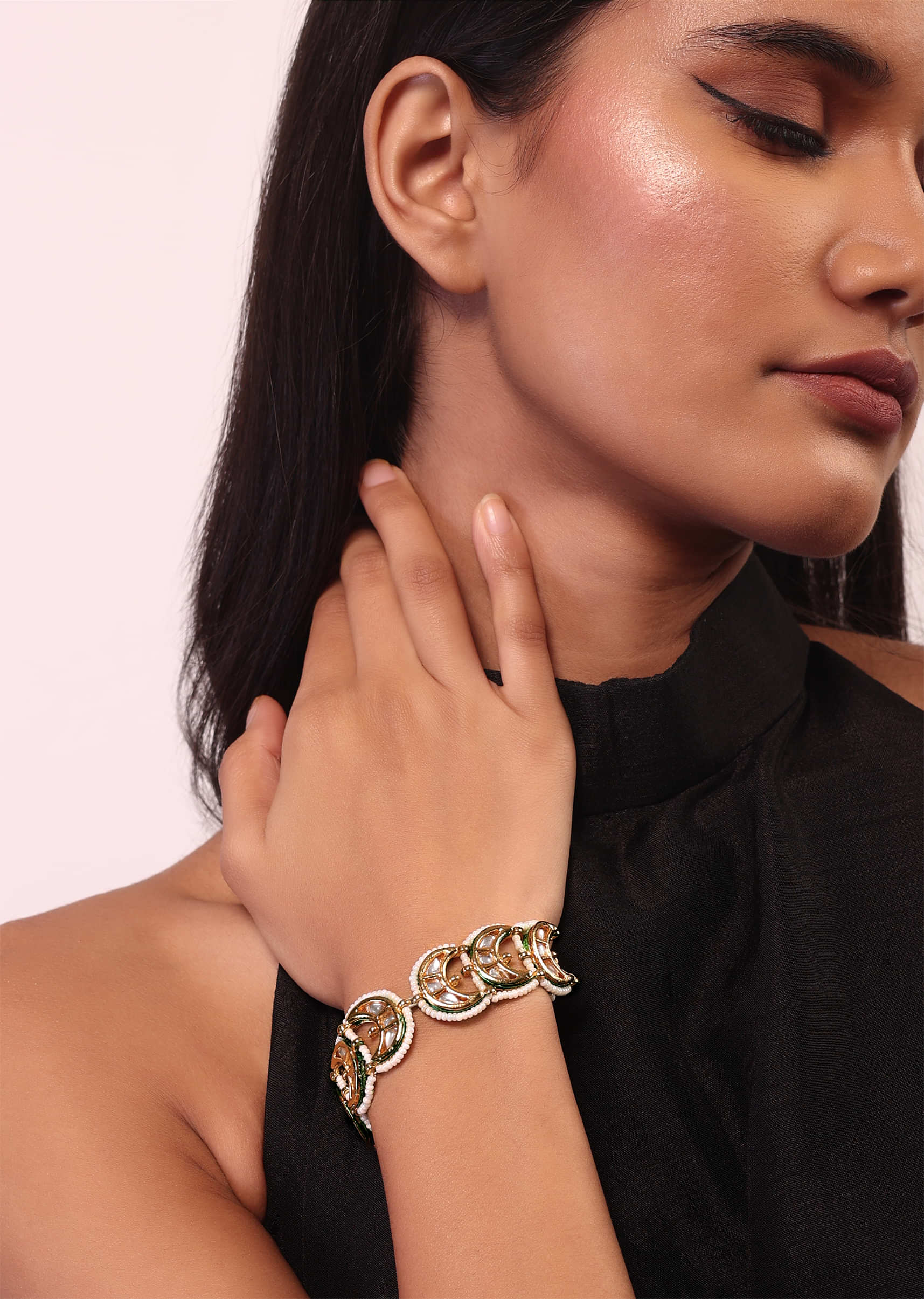 Kundan And Pearl Bracelet In Gold Tone