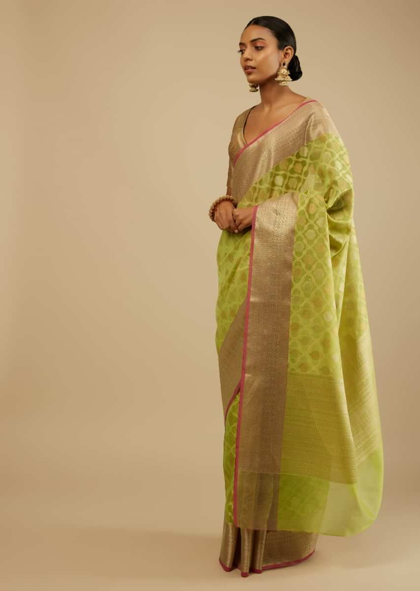 Lime Green Saree In Organza Silk With Woven Moroccan Jaal In Shades Of Silver And Gold Along With Unstitched Blouse  