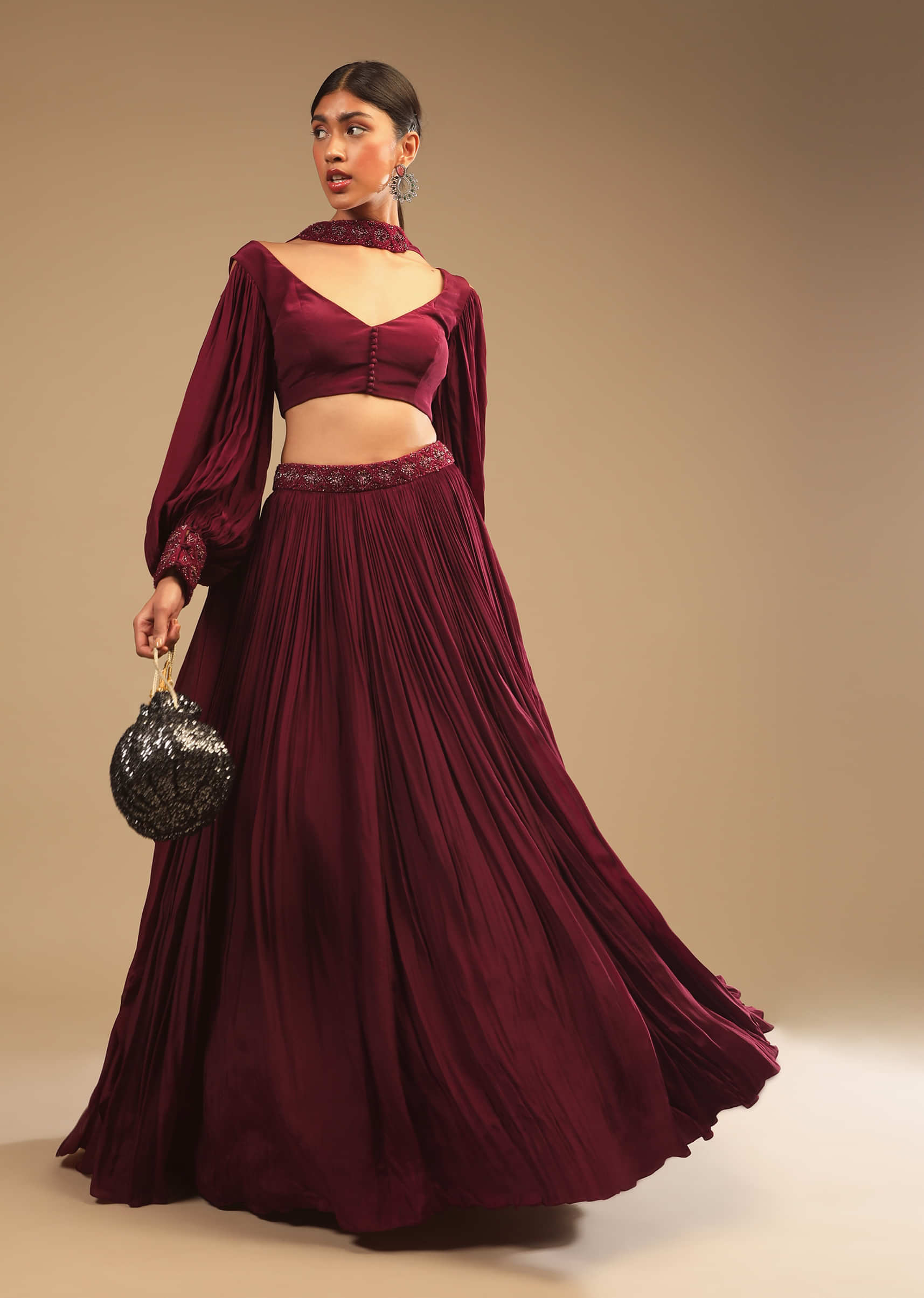 Maroon Lehenga In Crepe With Embroidery Detailing On The Waist And Bishop Sleeved Crop Top 