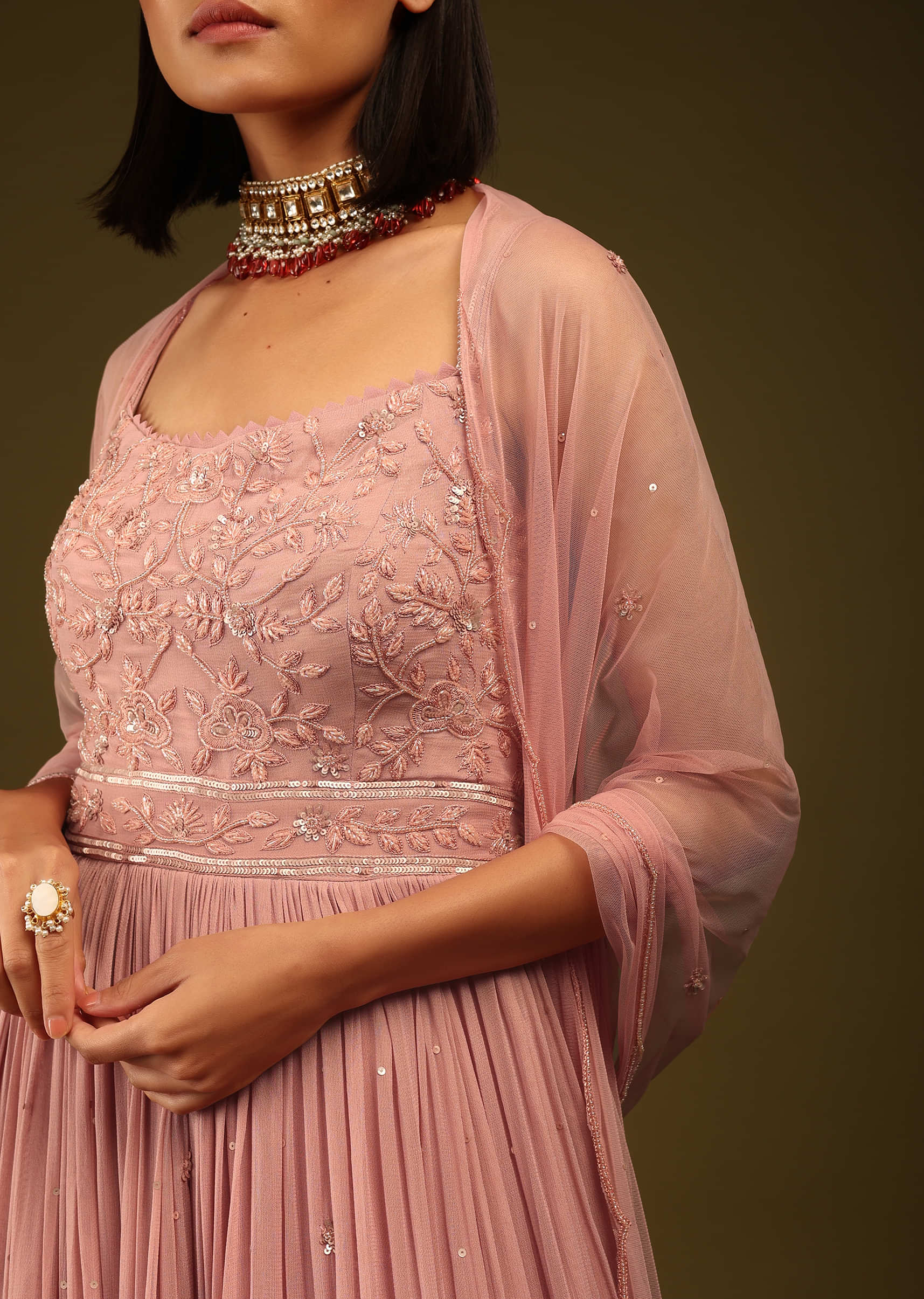 Mauve Glow Anarkali Suit Sequins And Cut Dana Embroidered Buttis All Over, Sleeveless, U Neckline Paired With The Matching Dupatta And Pants 