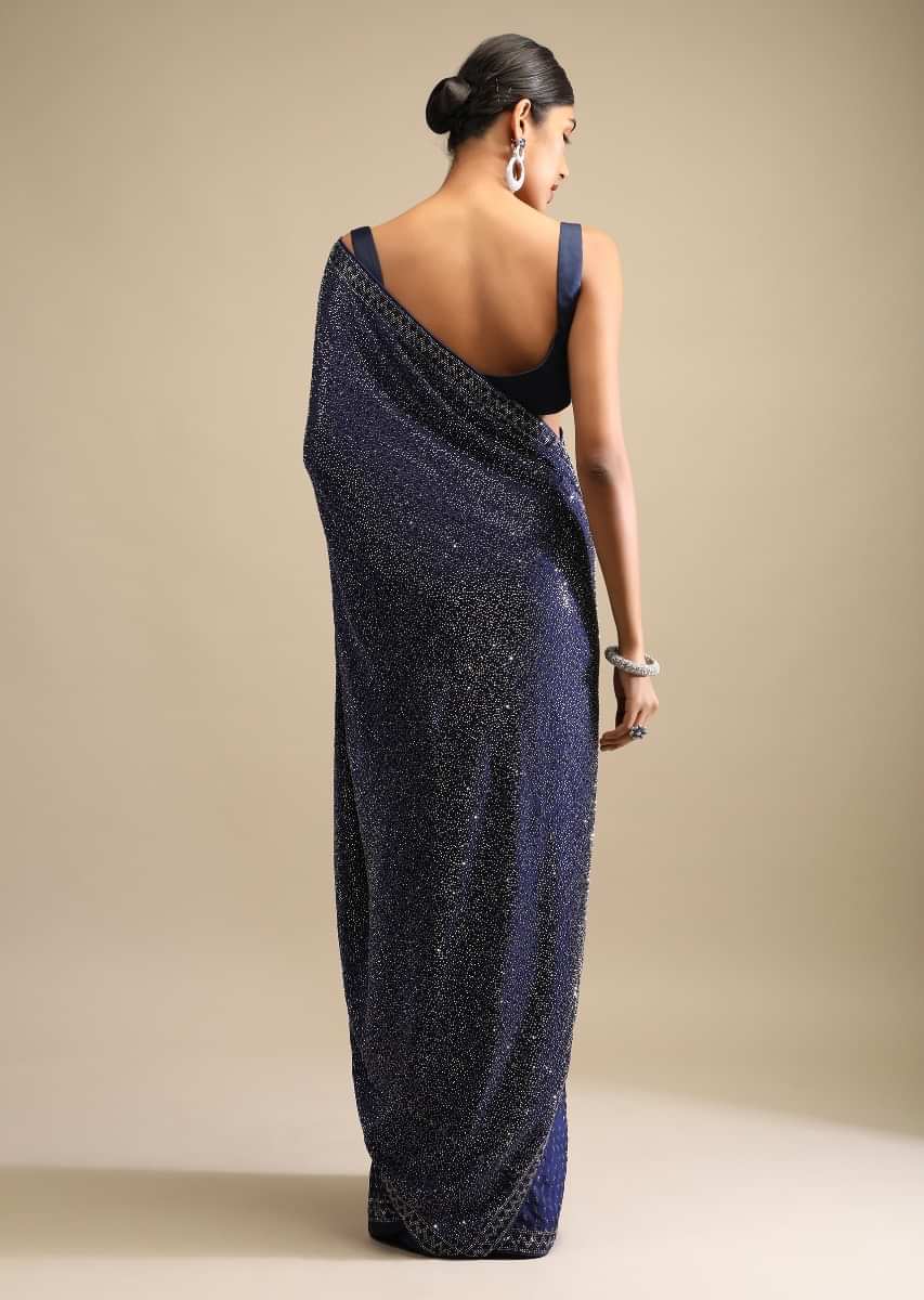 Midnight Blue Saree In Satin With A Heavy Embellished Pallu Using Scattered Sequins And Unstitched Blouse  