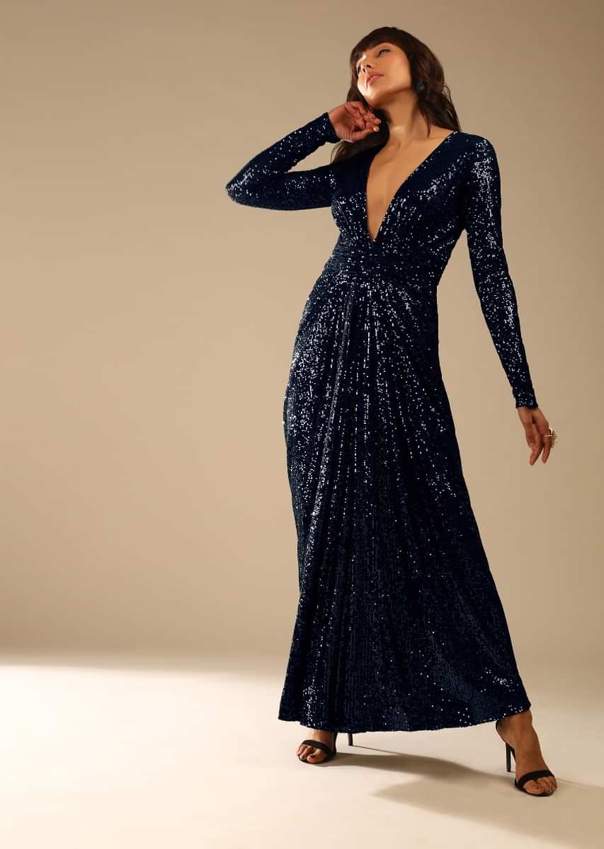 Midnight Blue Sequins Gown With Plunging V Neckline And Ruched Belt Along With Gathers In The Front