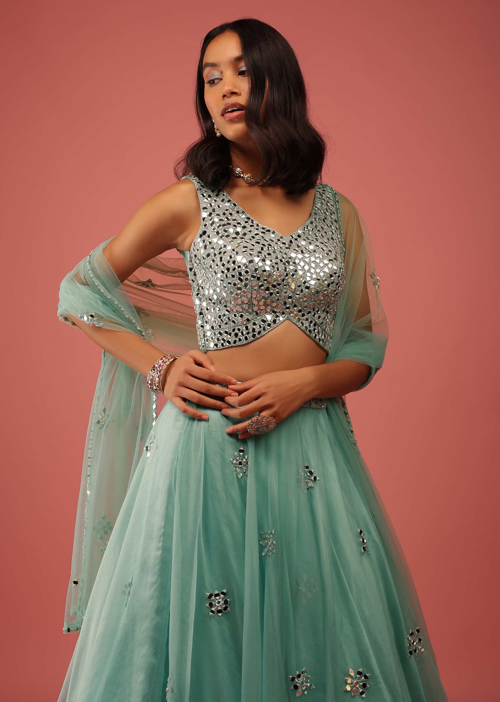Sea Green Lehenga In Organza With A Heavily Embroidered Crop Top In Mirror Work