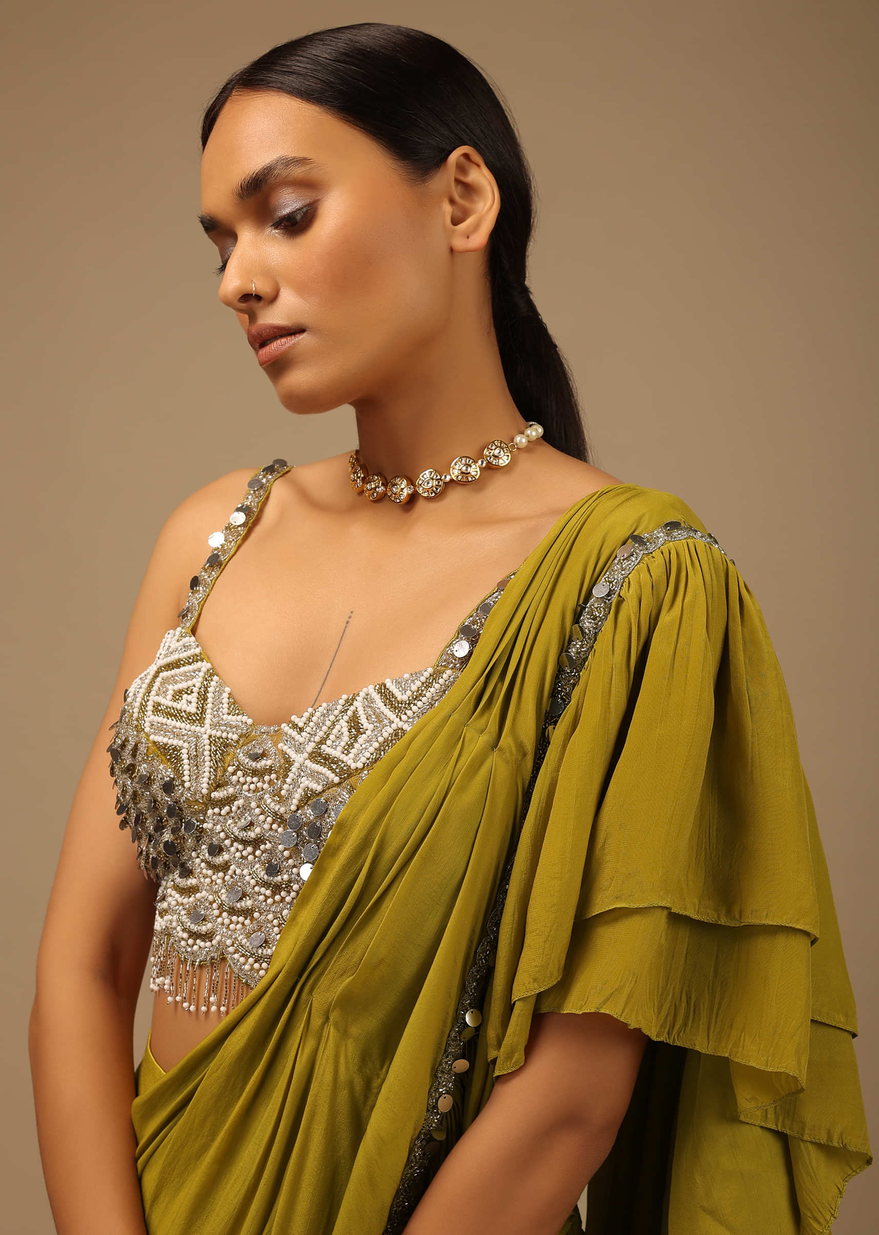 Moss Green Ready Pleated Ruffle Saree With A Heavy Sequins And Cut Dana Embroidered Crop Top