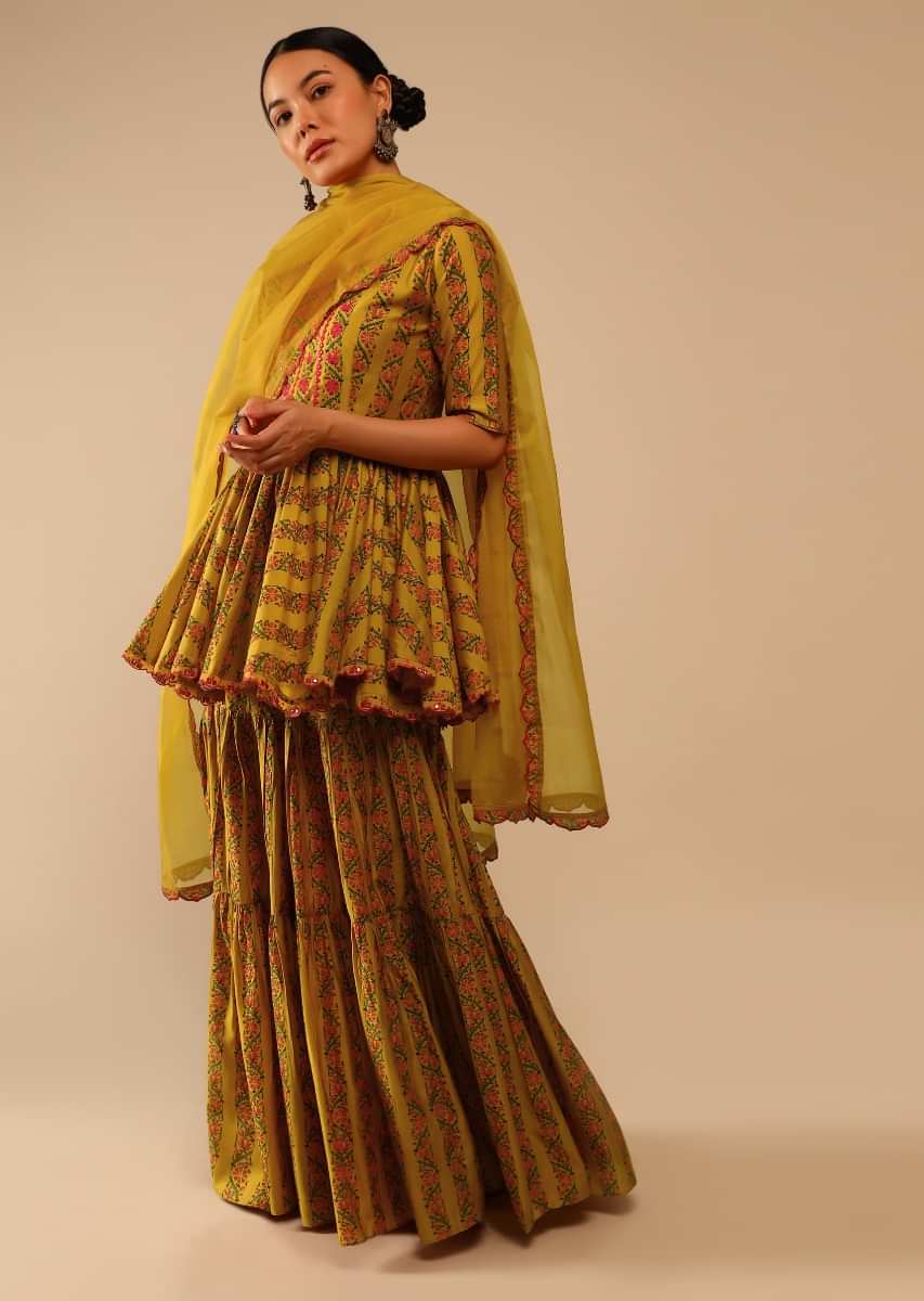 Mustard Sharara Suit In Cotton Blend With Peplum Kurti Adorned In Floral Print And Thread Embroidery  