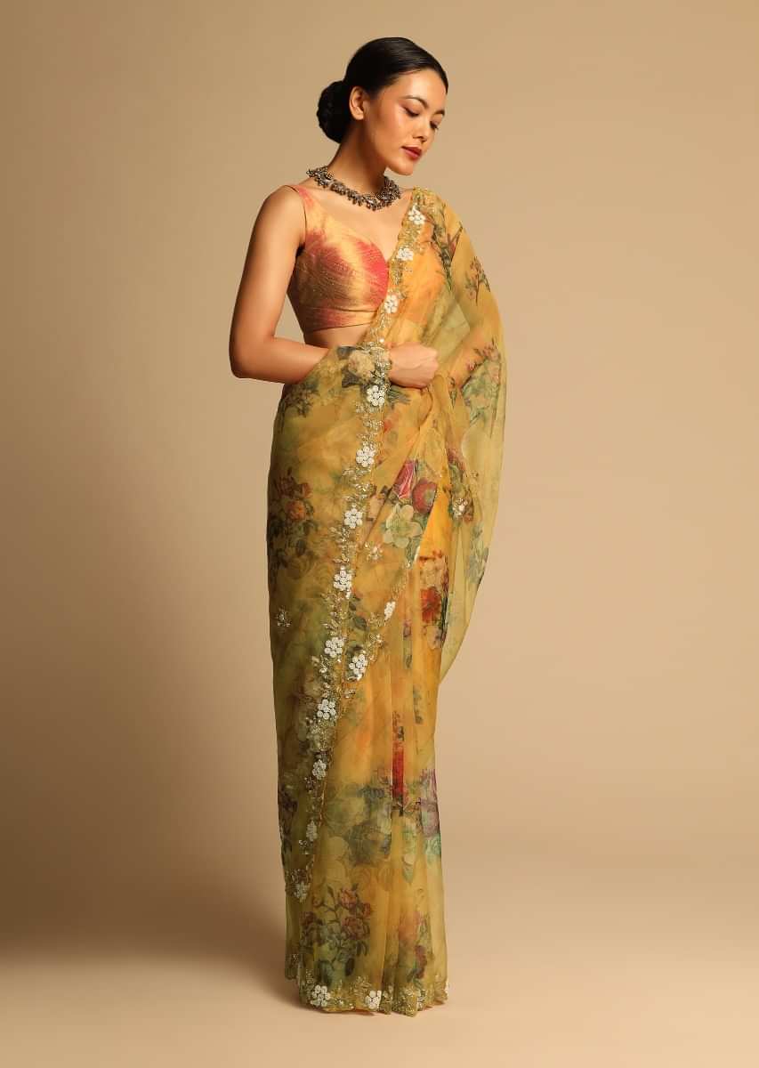 Mustard Yellow Saree In Organza With Floral Print All Over And Moti Embroidered Border Along With Unstitched Blouse