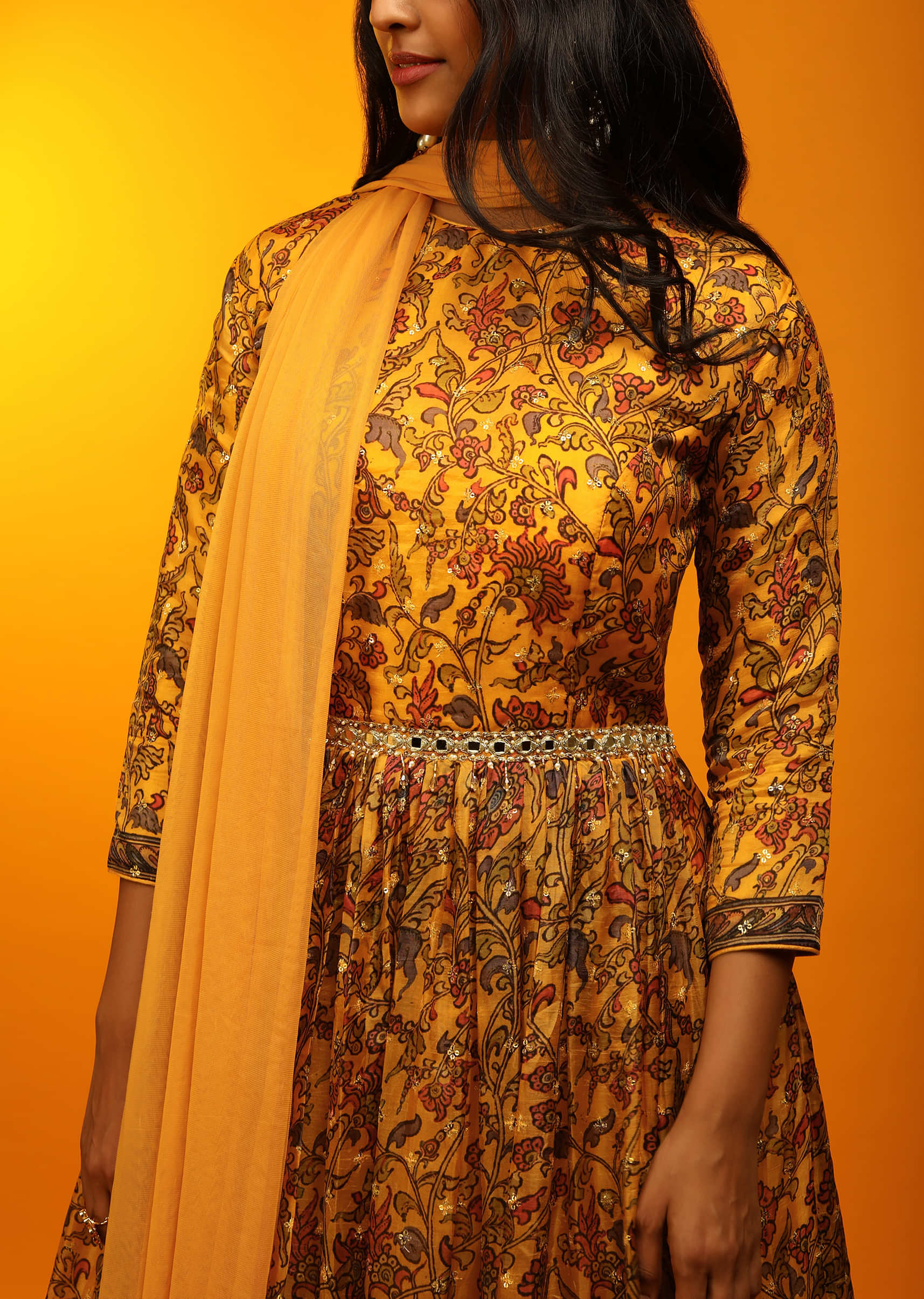 Mustard Anarkali Suit With Floral And Peacock Print And Mirror Embroidered Waistline