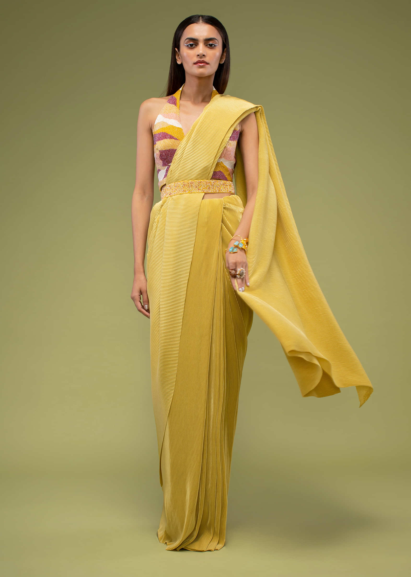 Mustard Yellow Ready-Pleated Saree In The Crush, Paired With The Crop Top In Sleeveless And A Plunging V Neckline