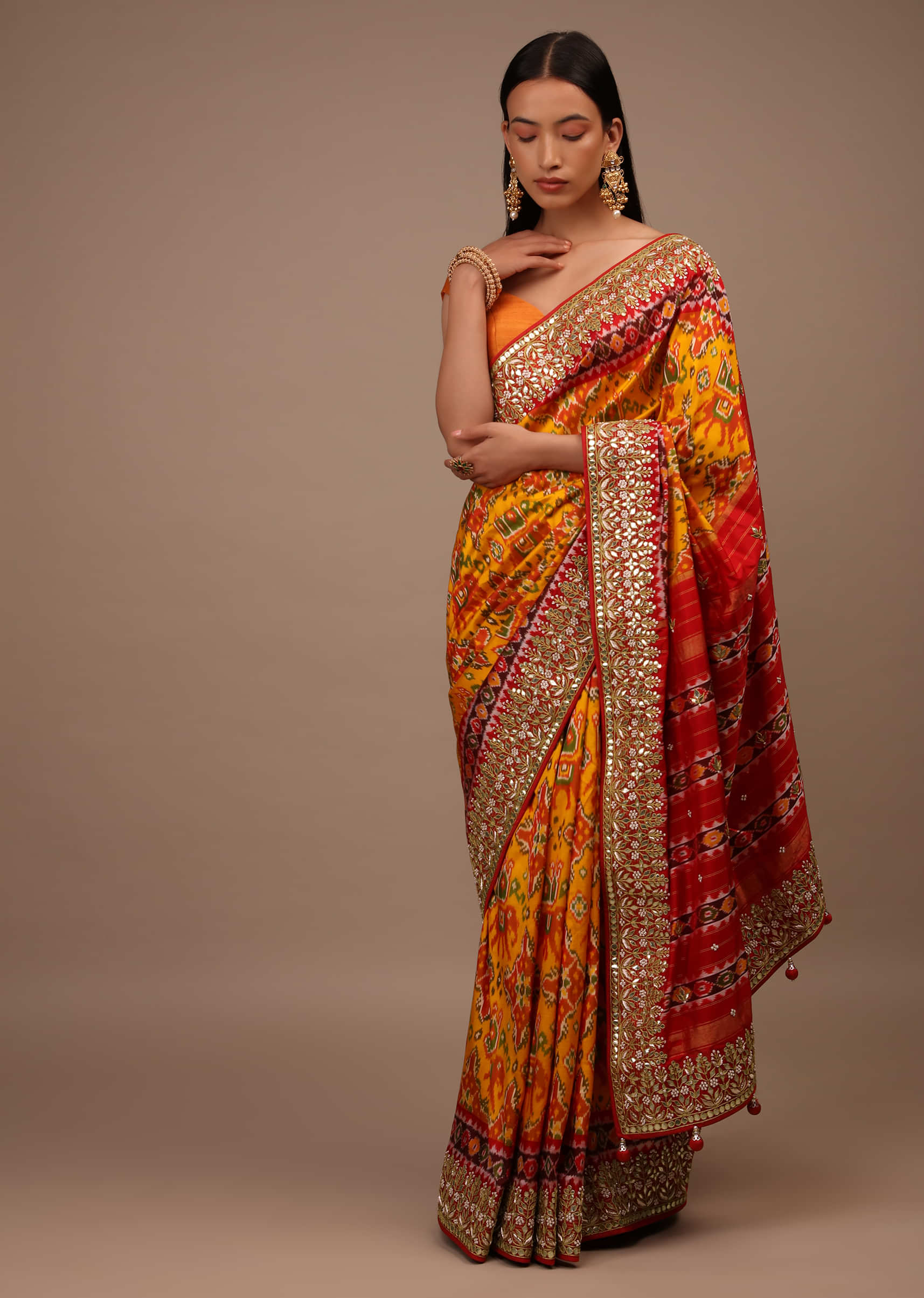 Mustard Yellow Saree In Silk With Pure Patola Weave And Gotta Patti Embroidered Border