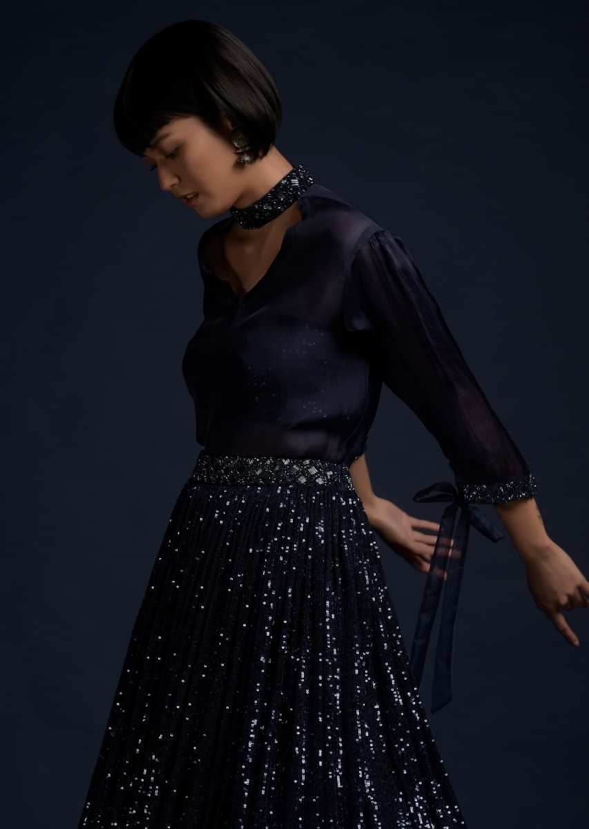 Navy Blue Lehenga Embellished In Sequins With A Matching Organza Top And Sequins Bustier