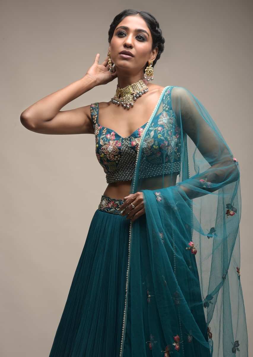 Ocean Green Lehenga With Gathered Flair And Resham Embroidered Spring Blooms On The Choli 