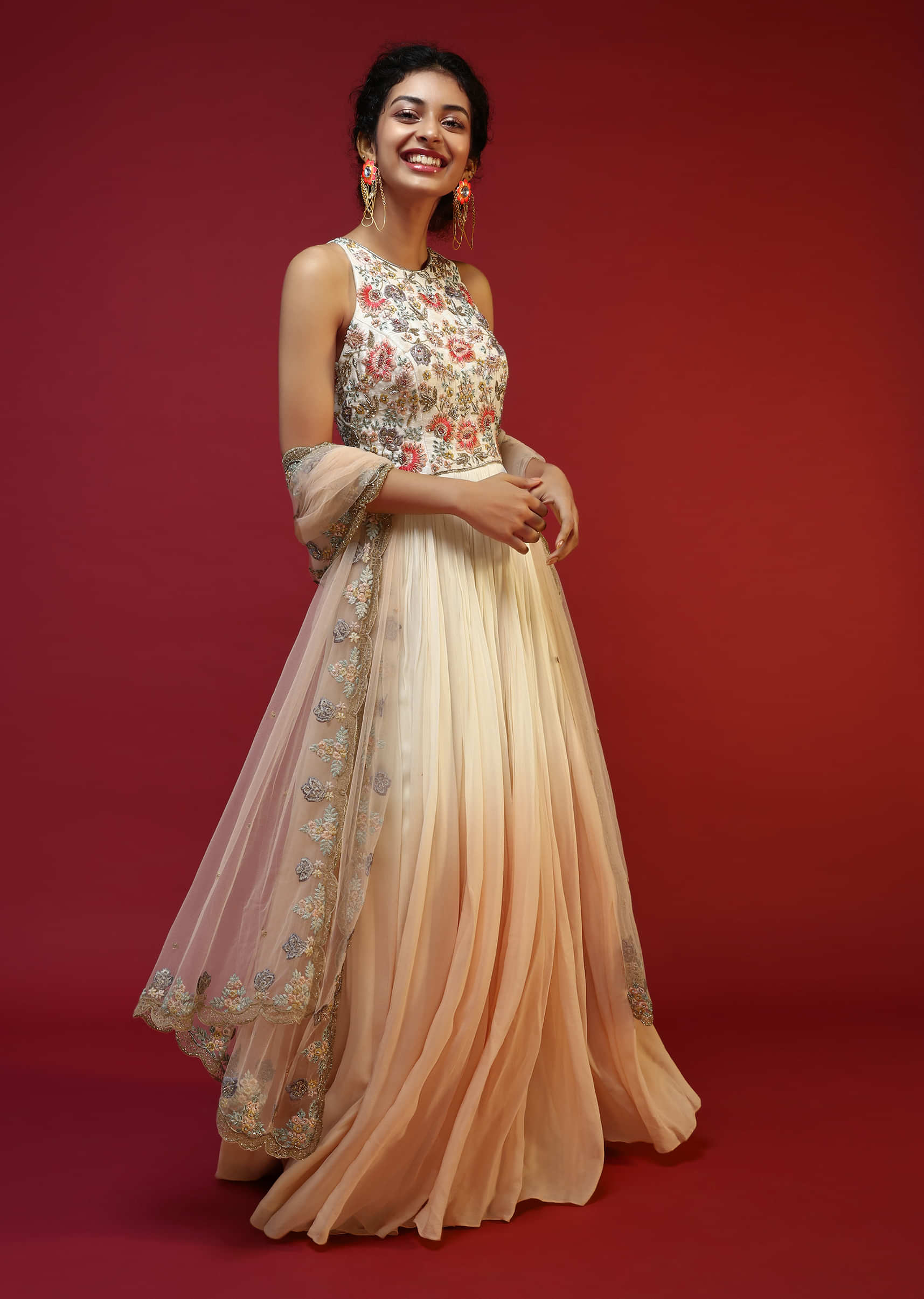 Off White Anarkali Suit With Halter Neckline And Adorned In Multicolored Hand Embroidered Floral Design On The Bodice  