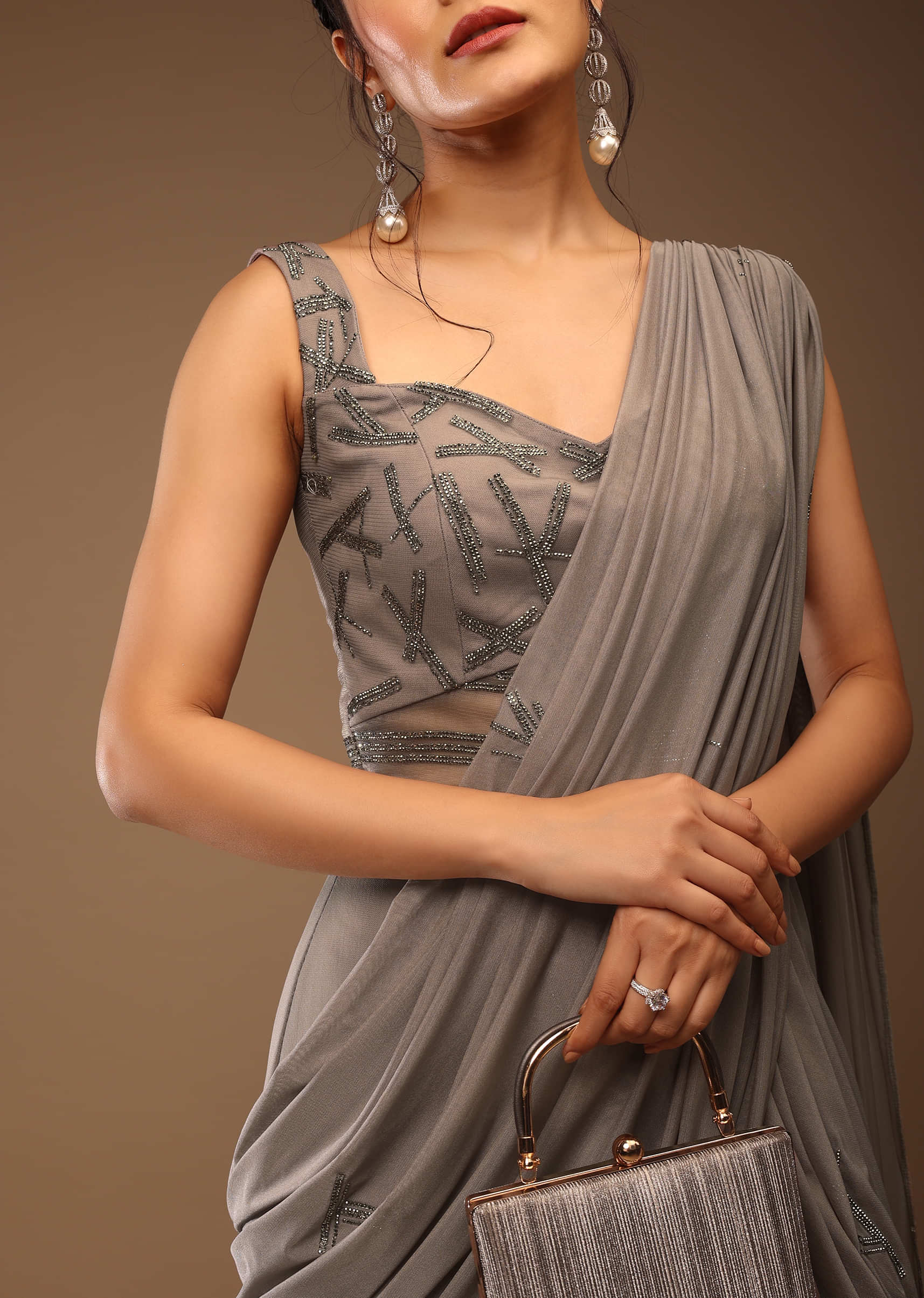 Opal Grey Ready-Pleated Saree Palazzo In Portrait Neckline Sleeveless With The Stones Embellishment In Linings Design