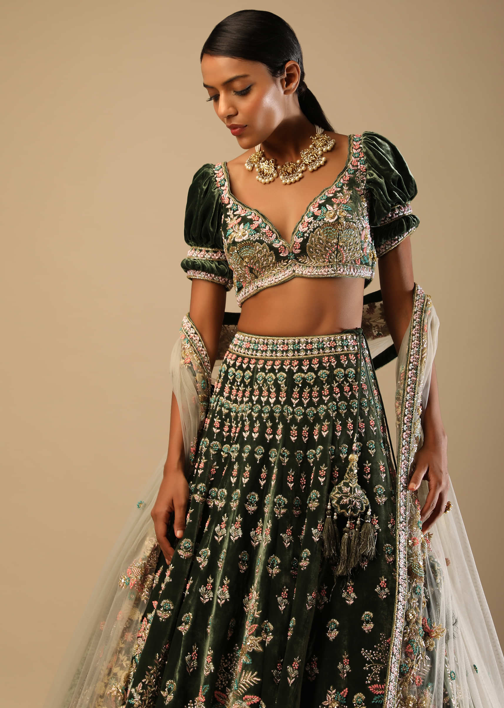 Palace Green Lehenga Choli In Velvet With Short Puff Sleeves And Multi Colored Hand Embroidery In Floral And Geometric Motifs 