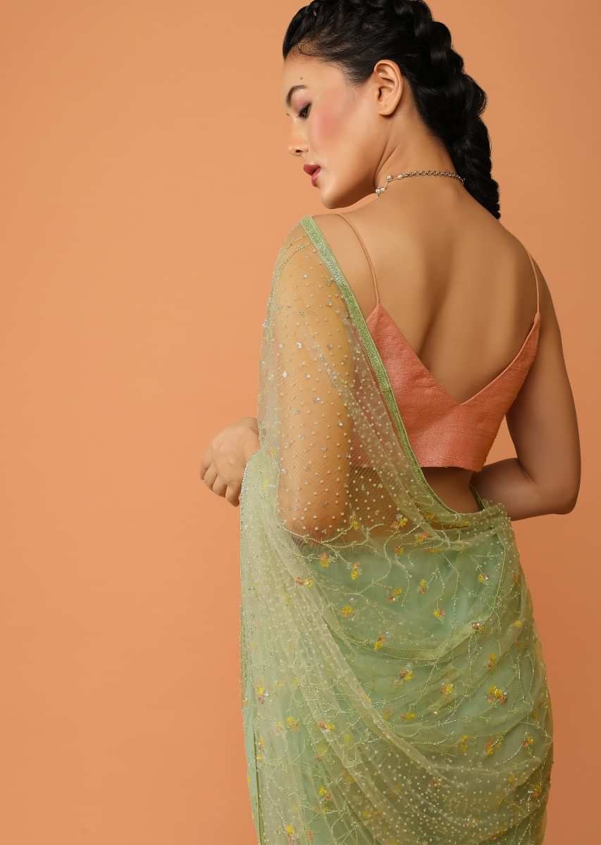 Pastel Green Saree In Net With Sequins And Cut Dana Embroidered Floral Jaal Design