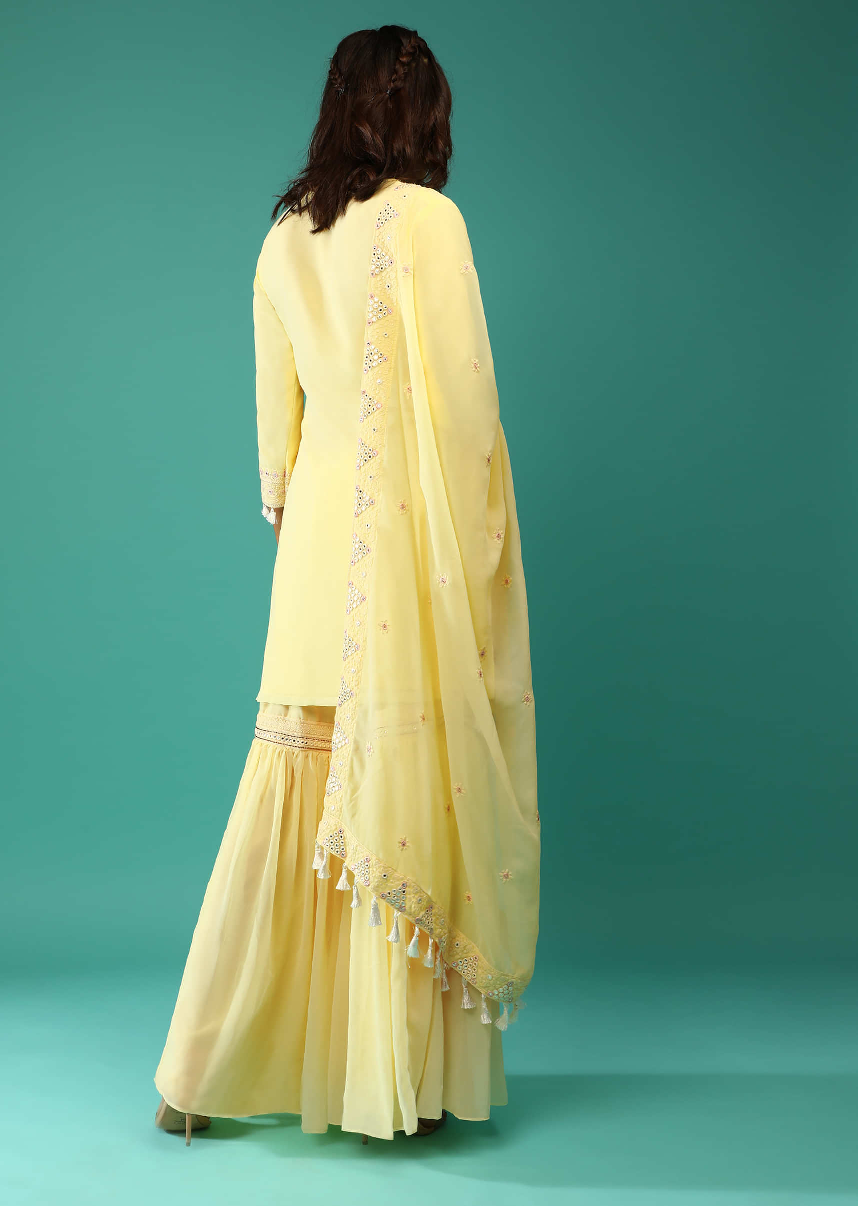Pastel Yellow Sharara Suit In Georgette With Lucknowi Embroidered Moroccan Jaal Along With Gotta Abla  And Tassel Details  