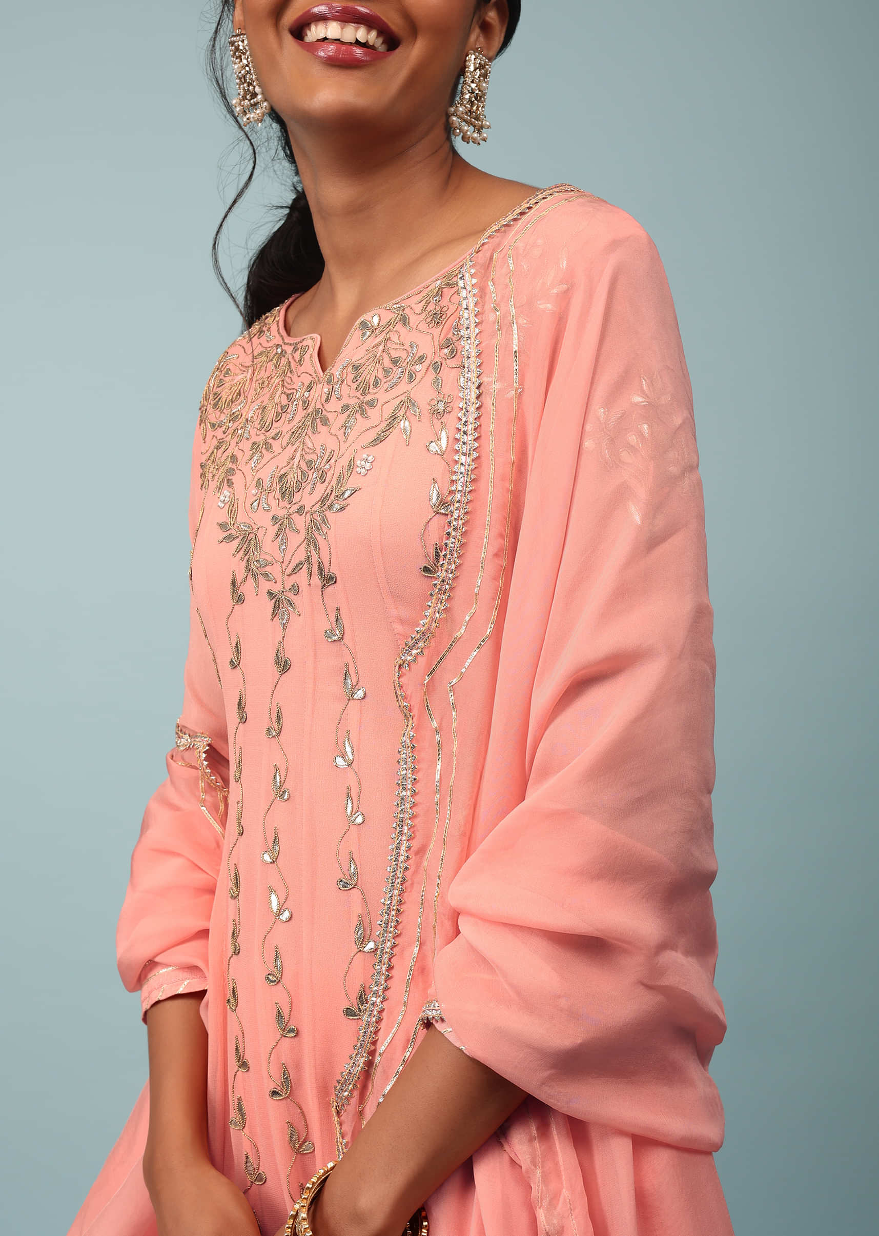 Peach Amber Embroidered Palazzo Suit In Georgette