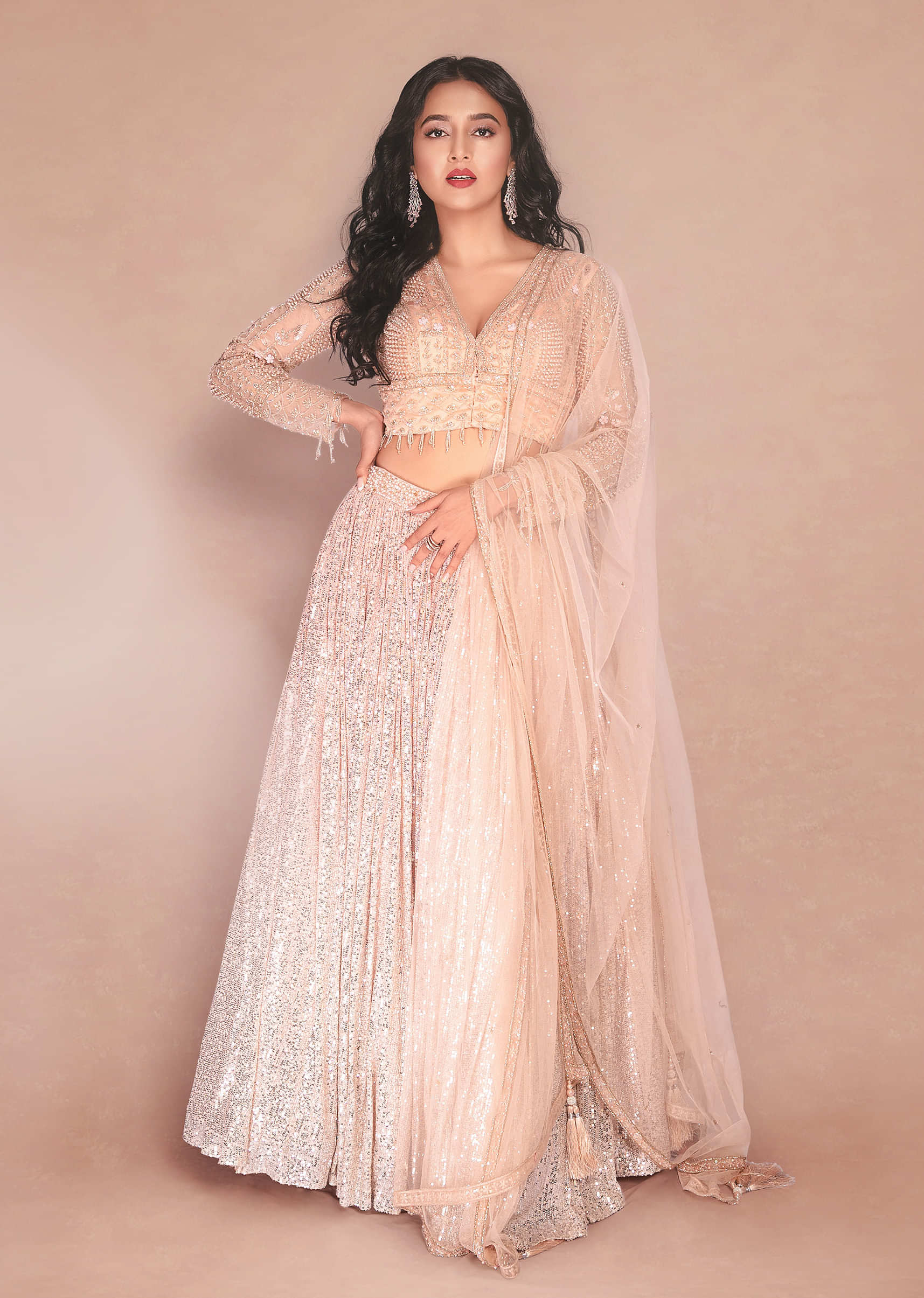 Peach And Silver Ombre Lehenga Embellished In Sequins And Hand Embroidered Choli With Plunging V Neckline