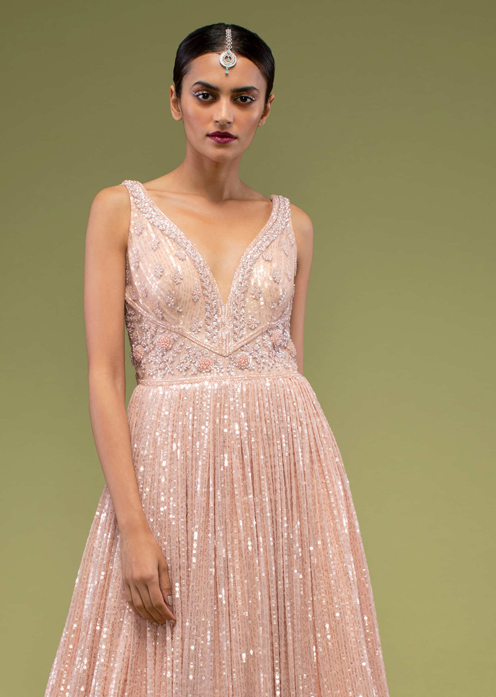 Peach Blush Gown In Sleeveless With Sequins Embroidery, Comes In A Sweetheart Neckline With Floral Embroidered Buttis