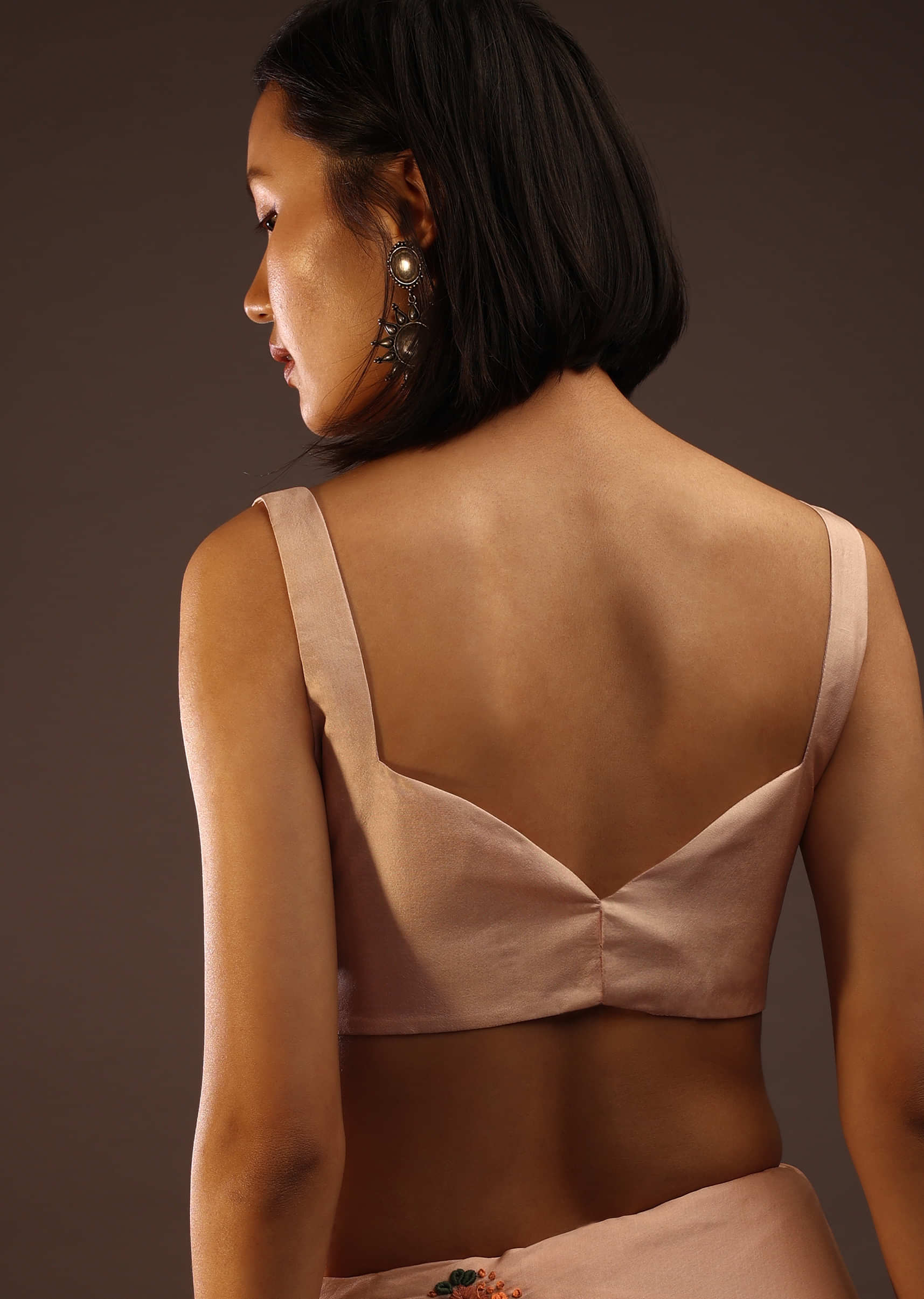 Peach Blush Sleeveless Blouse In A Sweetheart Neckline Back Hook Closure With A Straight Hemline