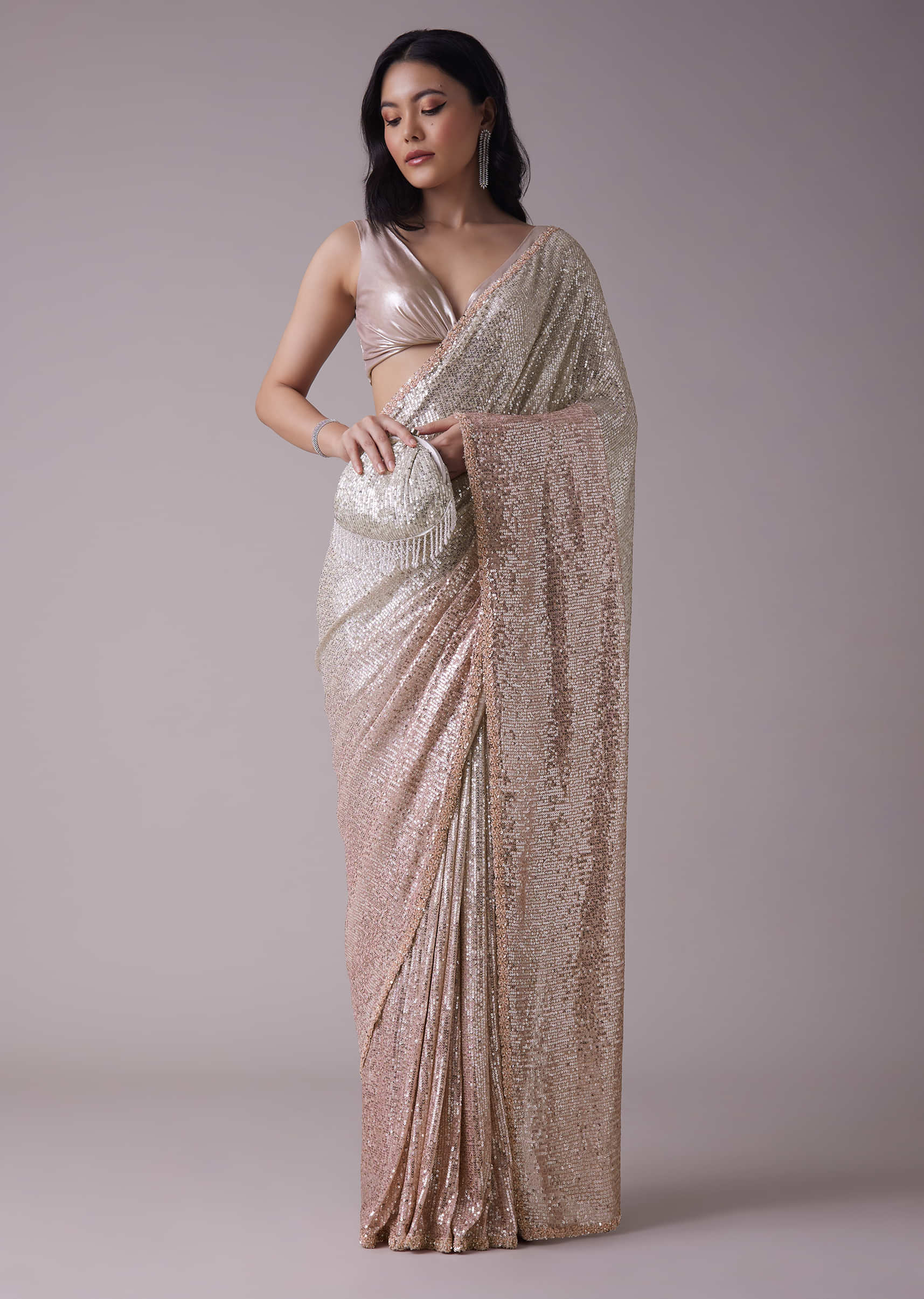 Peach Pink And Silver Toned Sequins Saree With An Embellished Border
