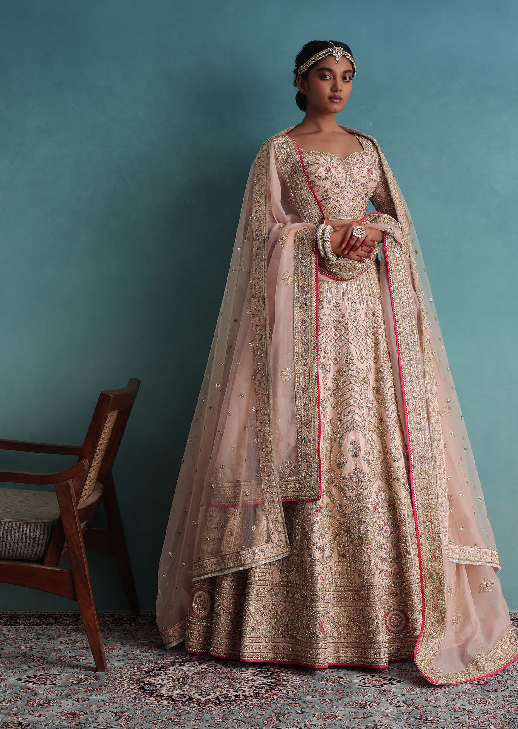 Peach Pink Embroidered 12 Kali Bridal Lehenga With Embroidered Belt In Raw Silk