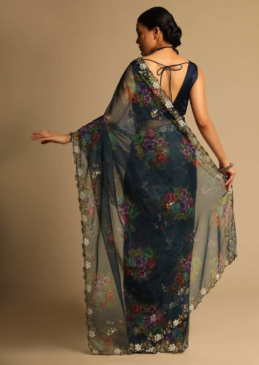 Peacock Blue Saree In Organza With Floral Print All Over And Moti Embroidered Border Along With Unstitched Blouse  