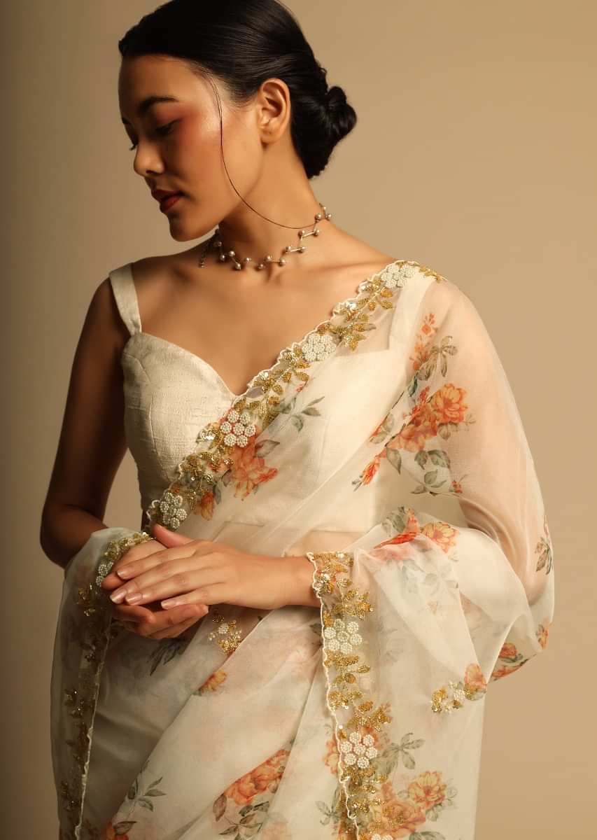 Pearl White Saree In Organza With Floral Print All Over And Moti Embroidered Border Along With Unstitched Blouse