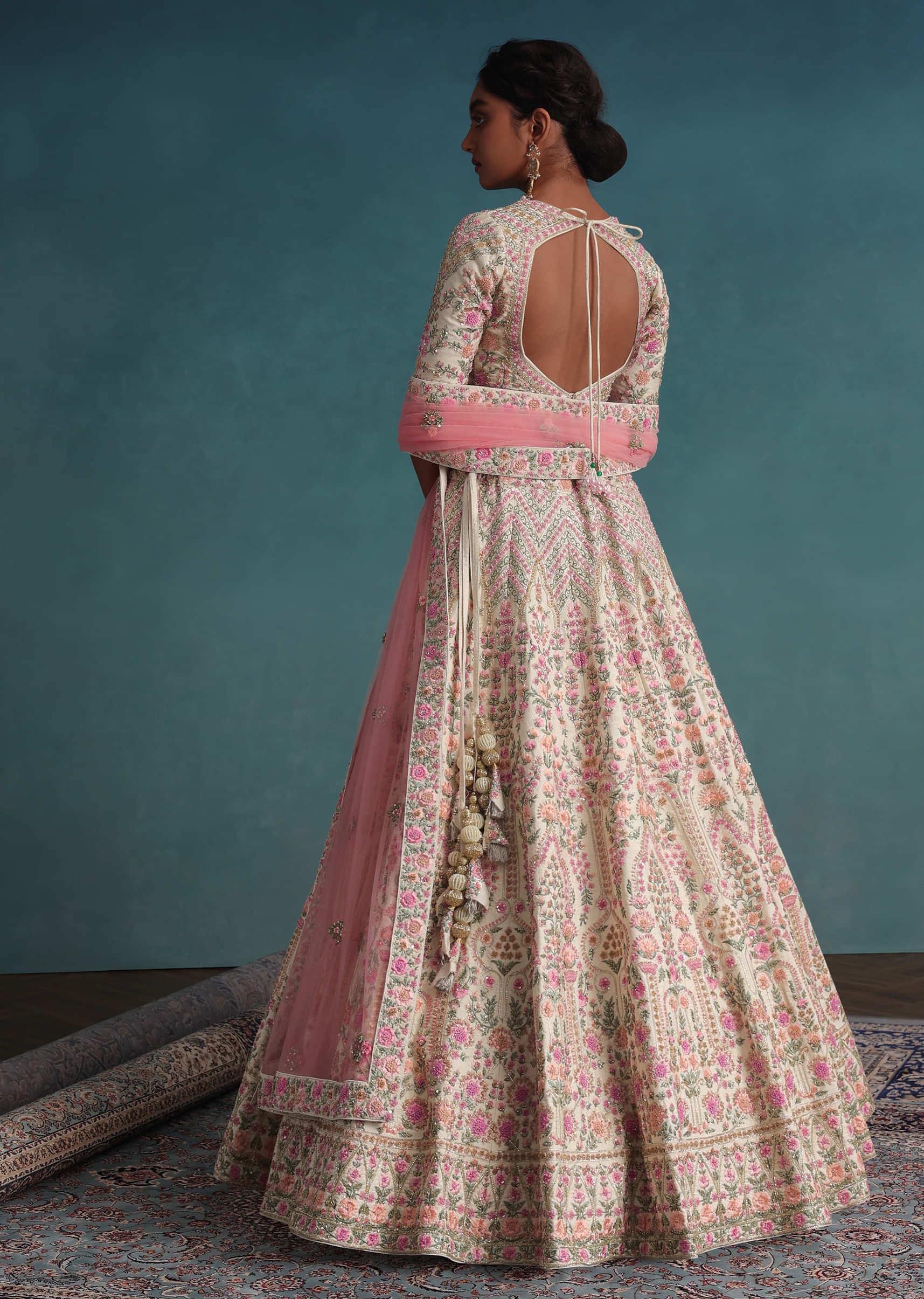 Pearl White Embroidered Bridal Lehenga In Raw Silk With Floral Hand Embroidery