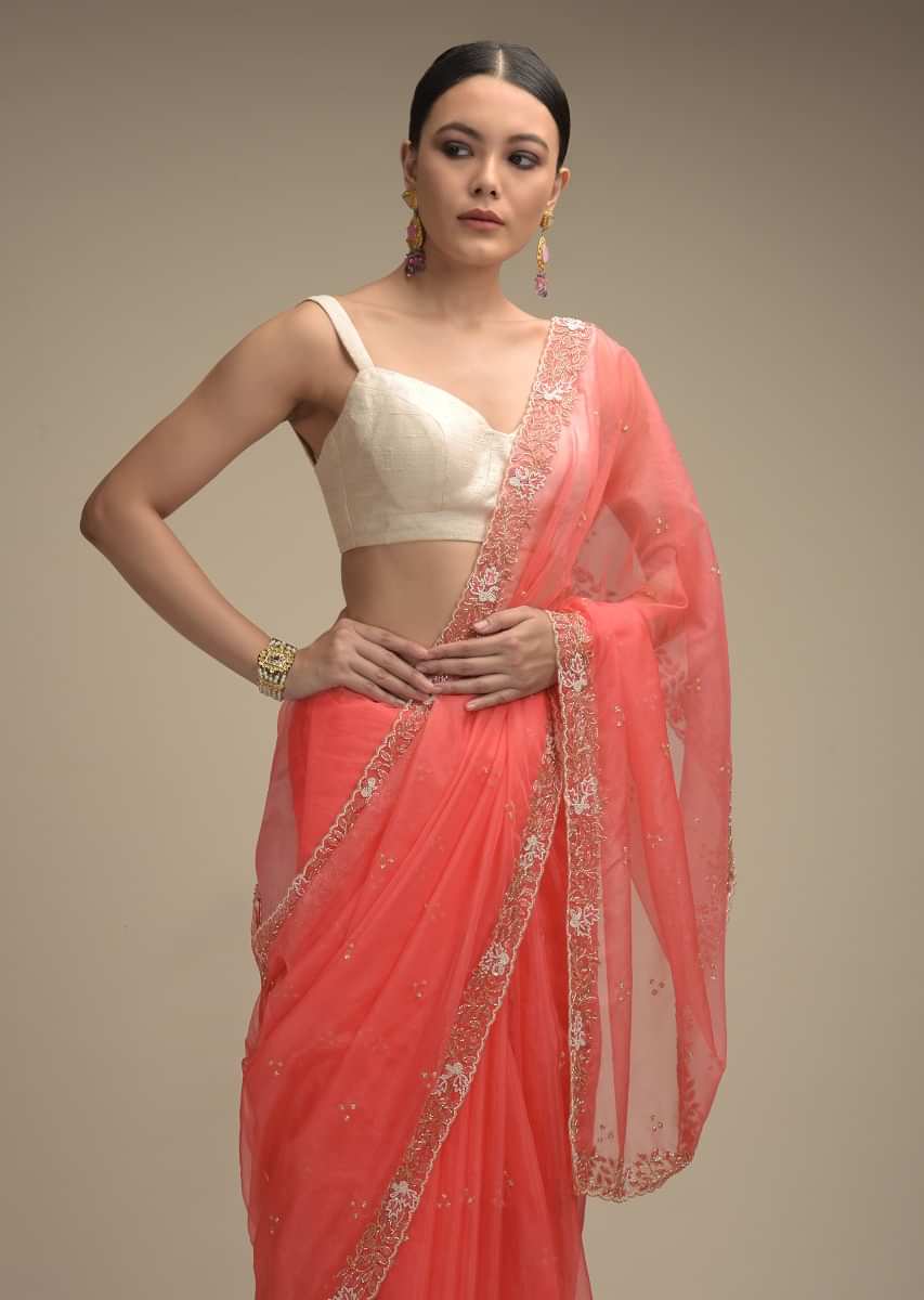Persian Pink Saree In Organza With Hand Embroidered Floral Floral Border And Scattered Buttis  