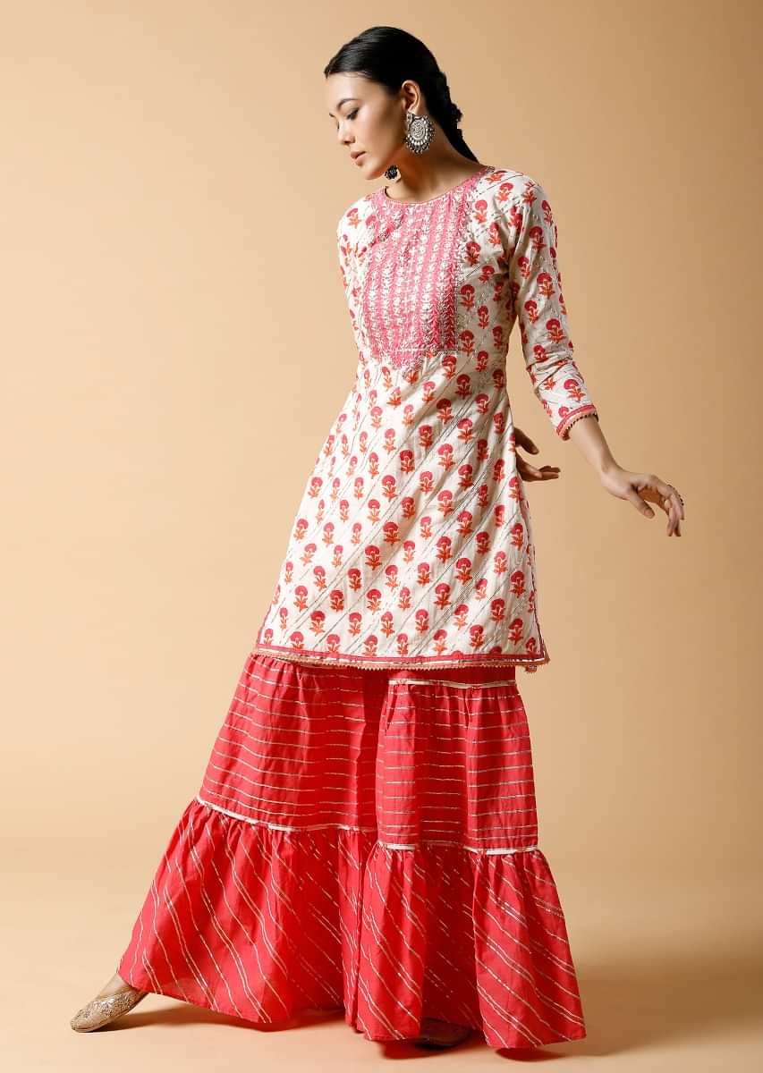 Pink And White Sharara Suit With Printed Floral Buttis And Detailed Using Zari And Gotta Lace 