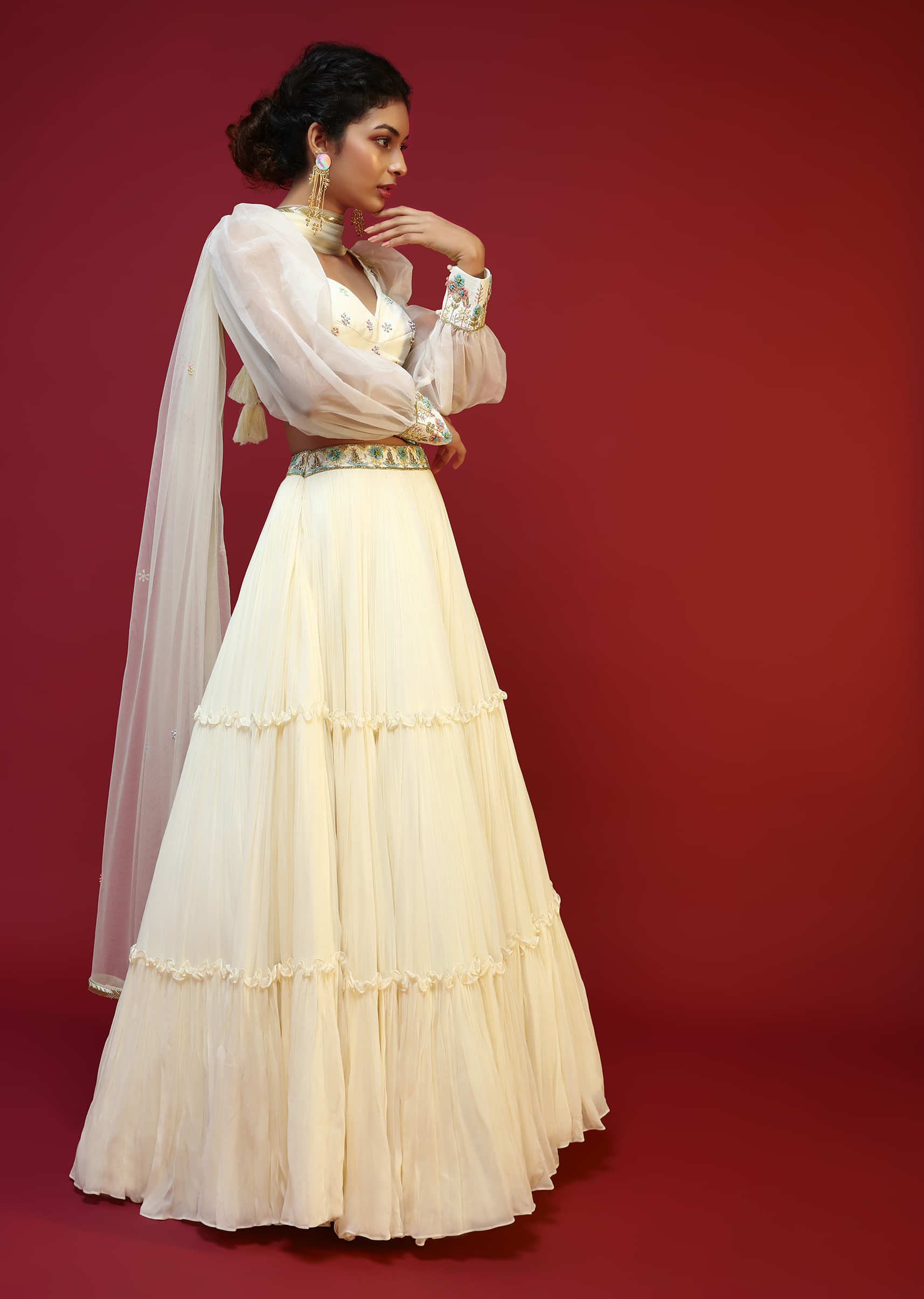 Powder White Lehenga Choli With Elaborate Balloon Sleeves And Multi Colored Hand Embroidered Buttis 
