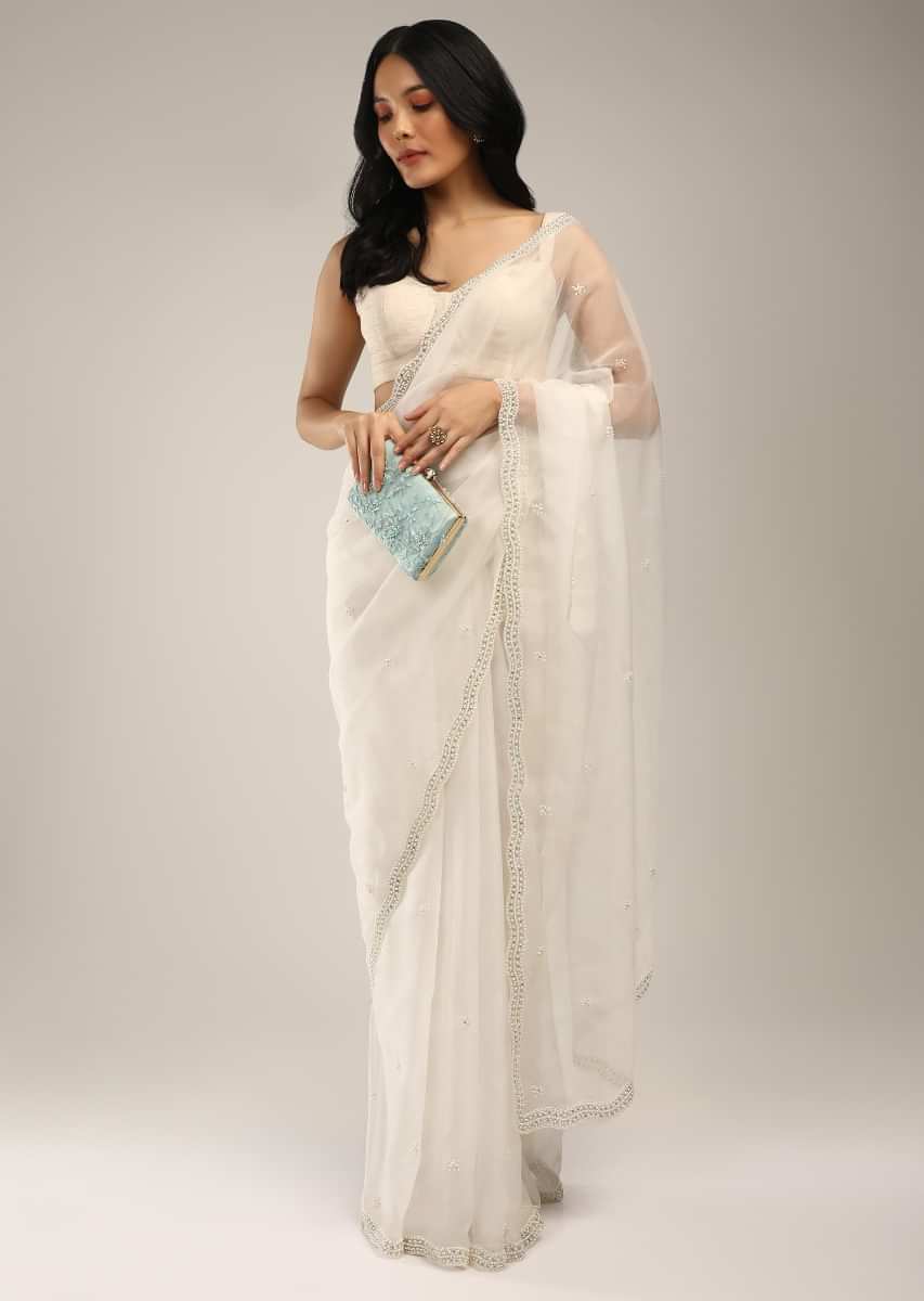Powder White Saree In Organza With Moti And Stones Embroidered Border And Butti Design  