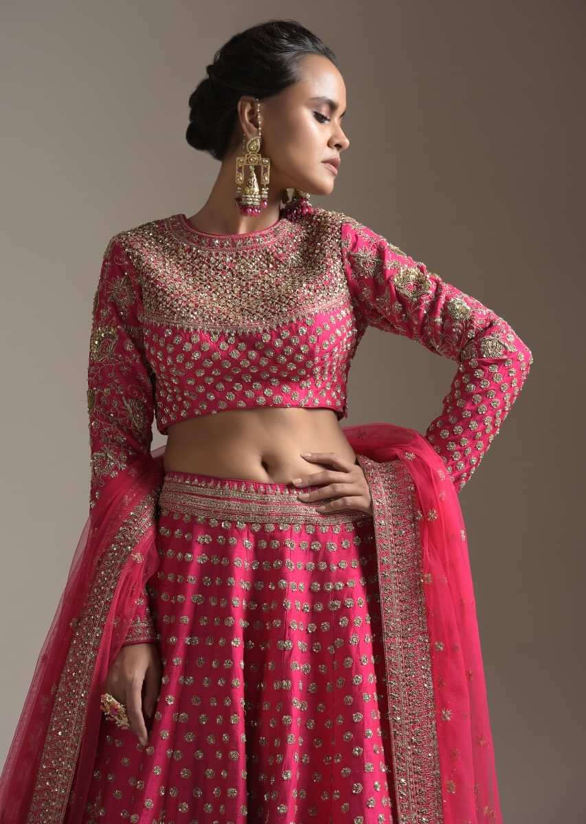 Rani Pink Lehenga Choli In Raw Silk With Heavy Embroidery Work In Heritage Floral Design And Butti Work