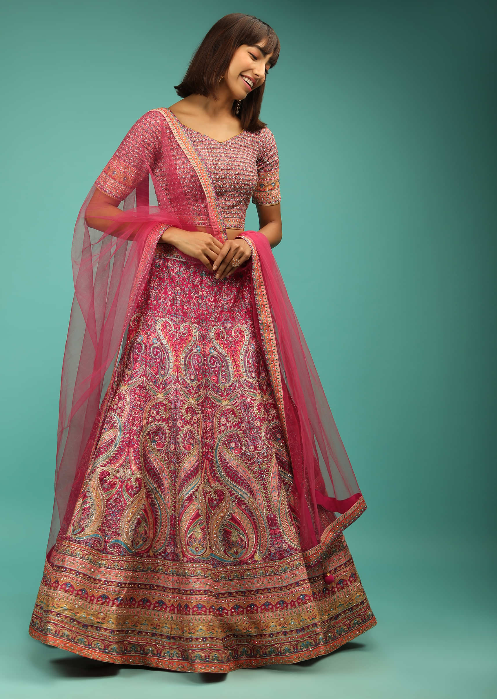 Rani Pink Lehenga Choli With Ethnic Floral Print And Zari Accents 