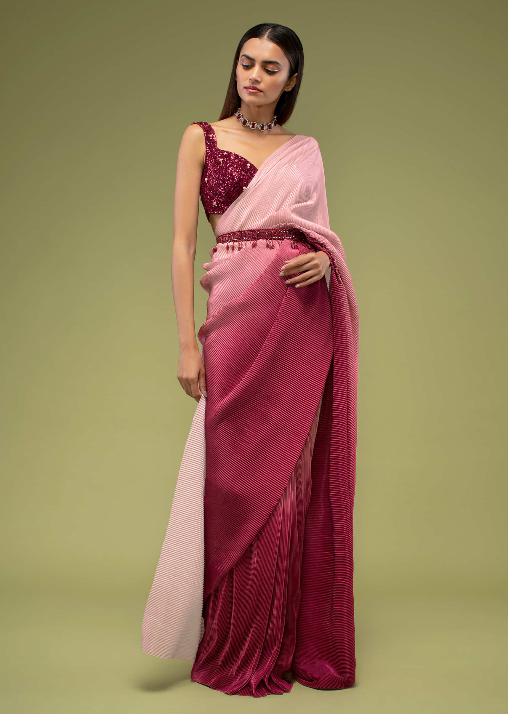 Raspberry Red Ombre Saree And A Crop Top In Sequins Embroidery, Paired With The Crop Top In Sleeveless And A Sweet Heart Neckline