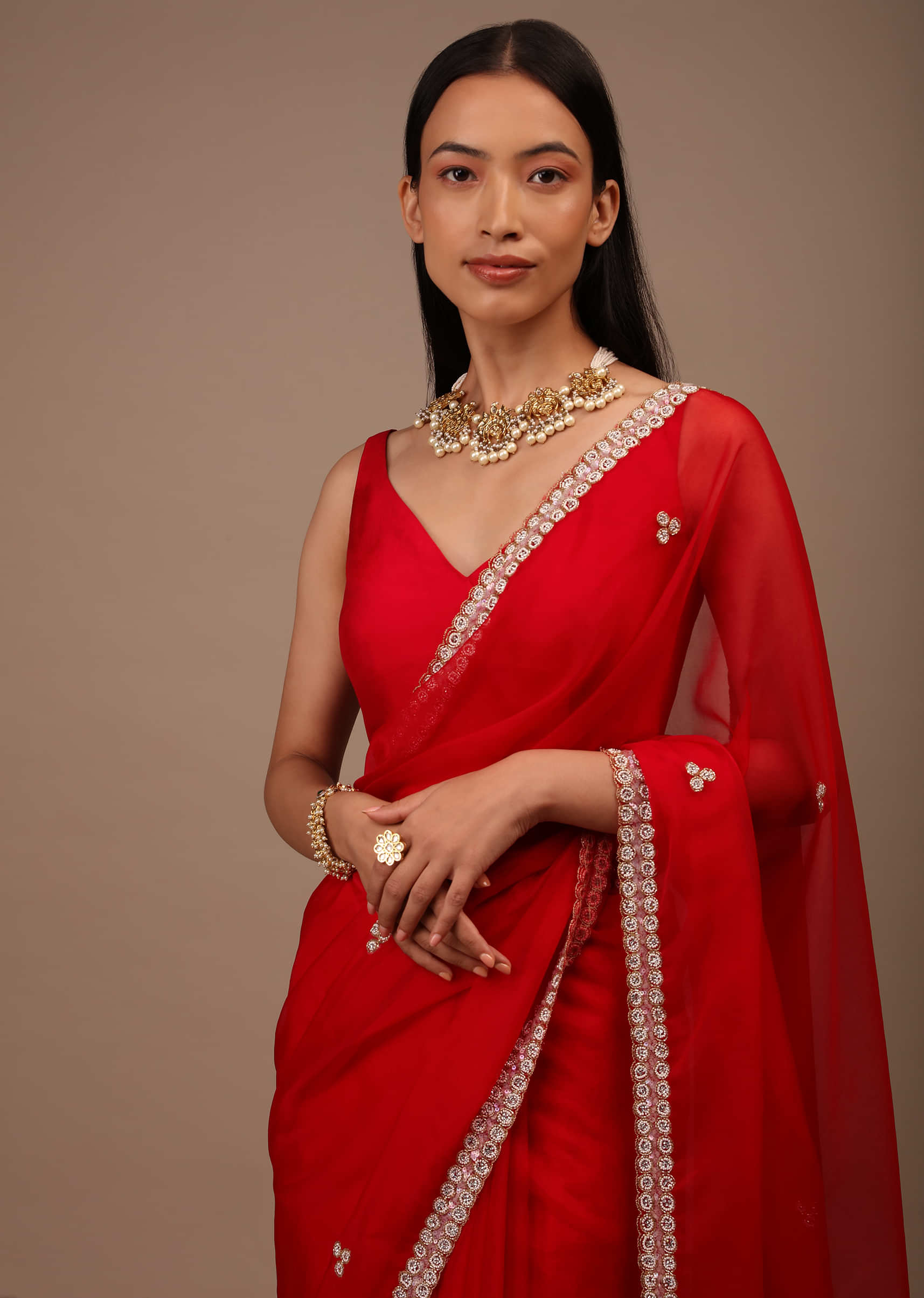 Red Saree In Organza With Hand Embellished Cut Dana And Moti Detailing On The Border