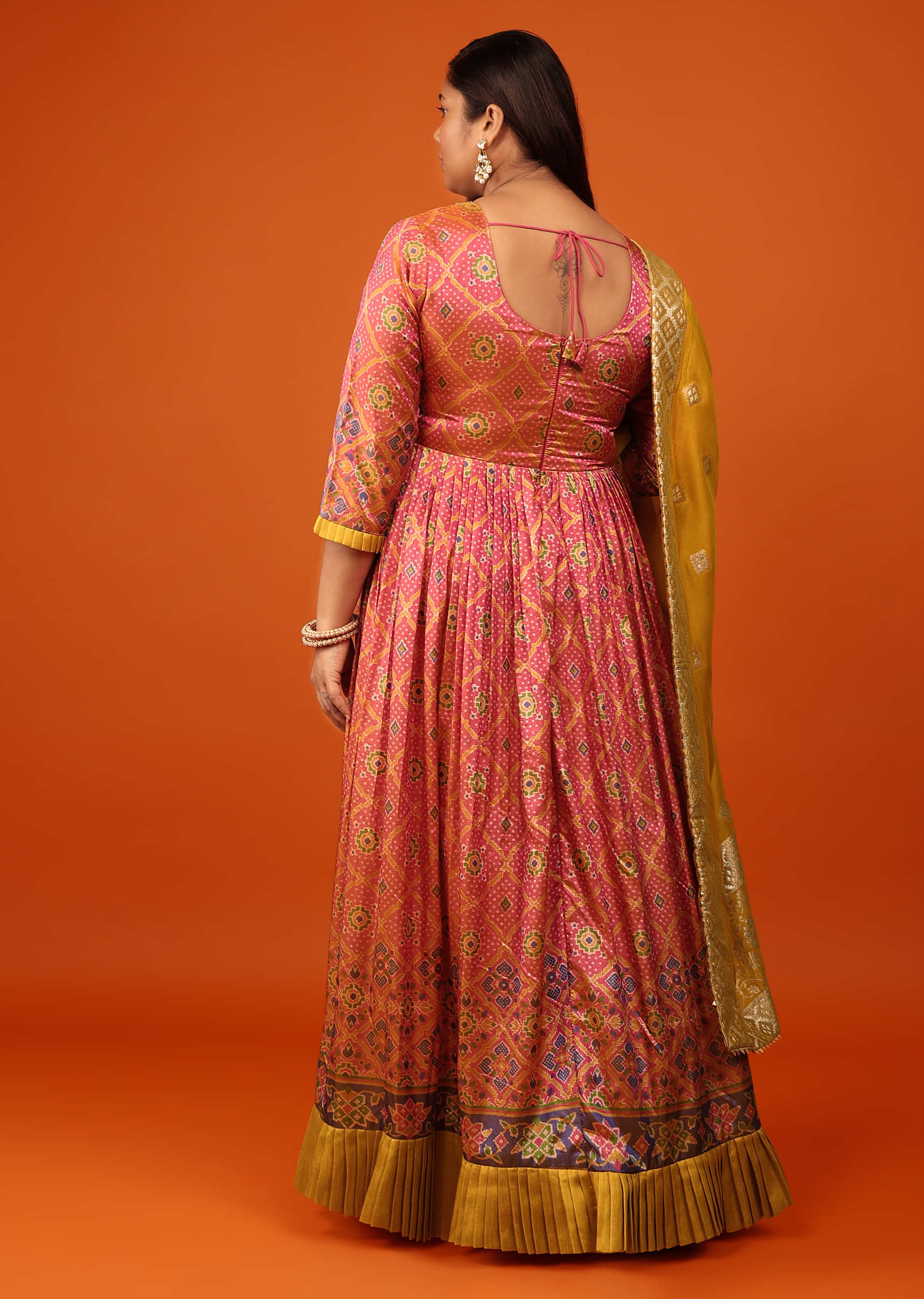 Rouge Pink Anarkali Suit In Silk With Bandhani And Patola Print And Contrast Mustard Frill
