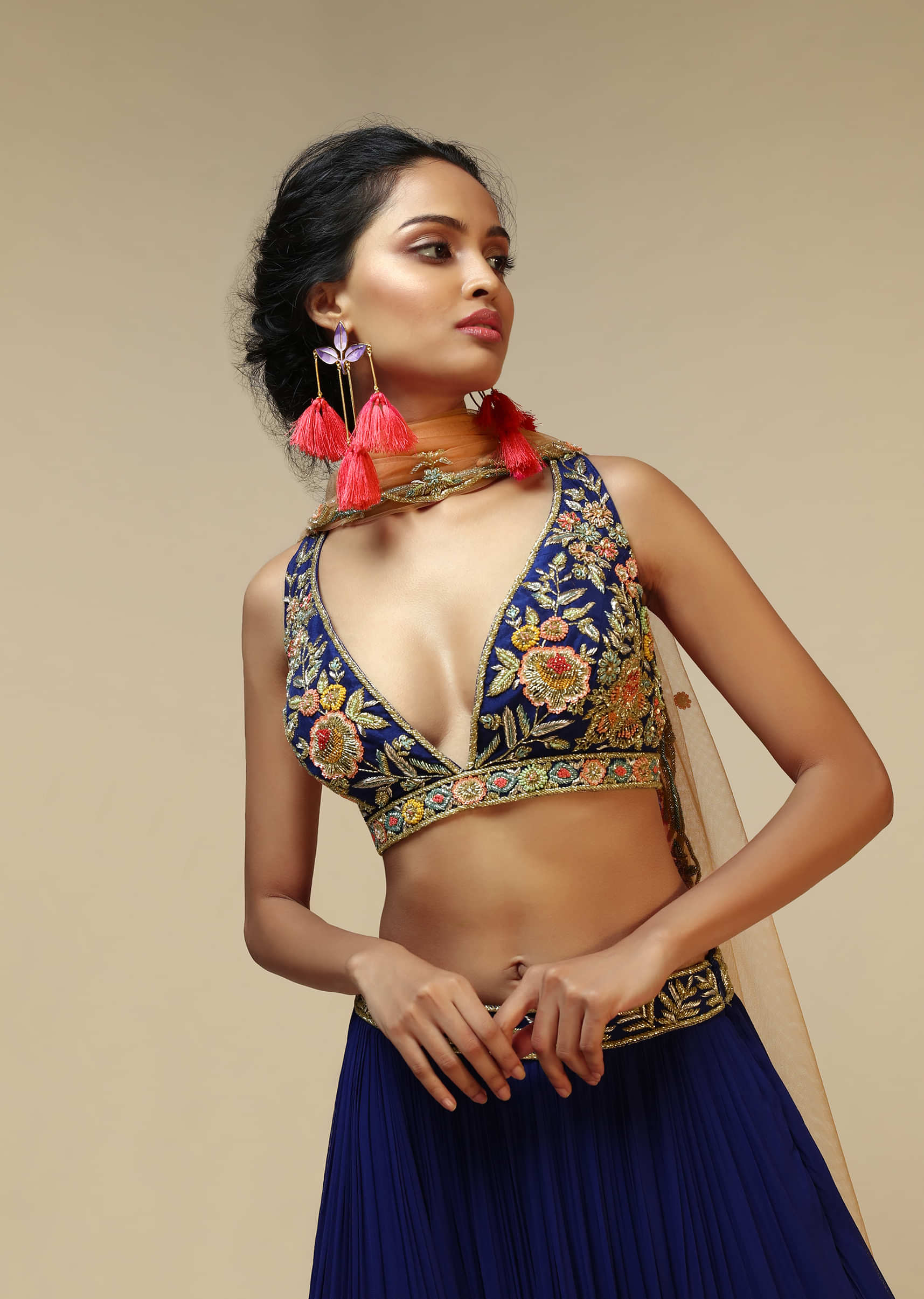 Royal Blue Lehenga Choli With Plunging Neckline And Hand Embroidered Using Multi Colored Beads And Resham 