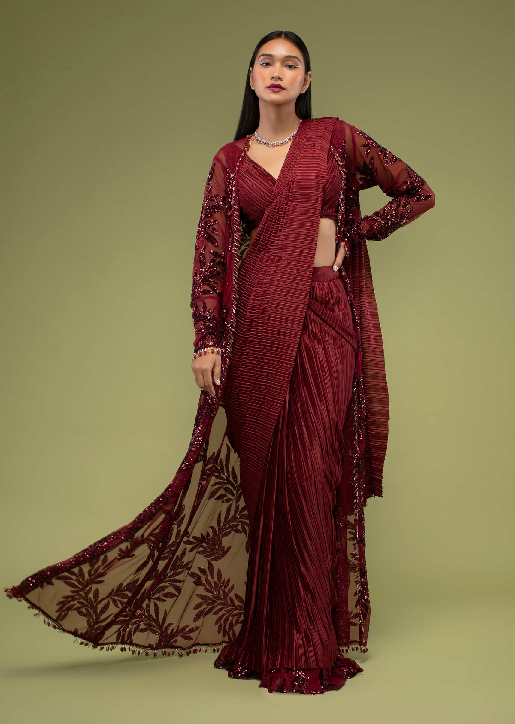 Rumba Red Ready Pleated Saree In The Crush,  Paired With A Jacket Crafted In Net  With Moti Fringes On The Border