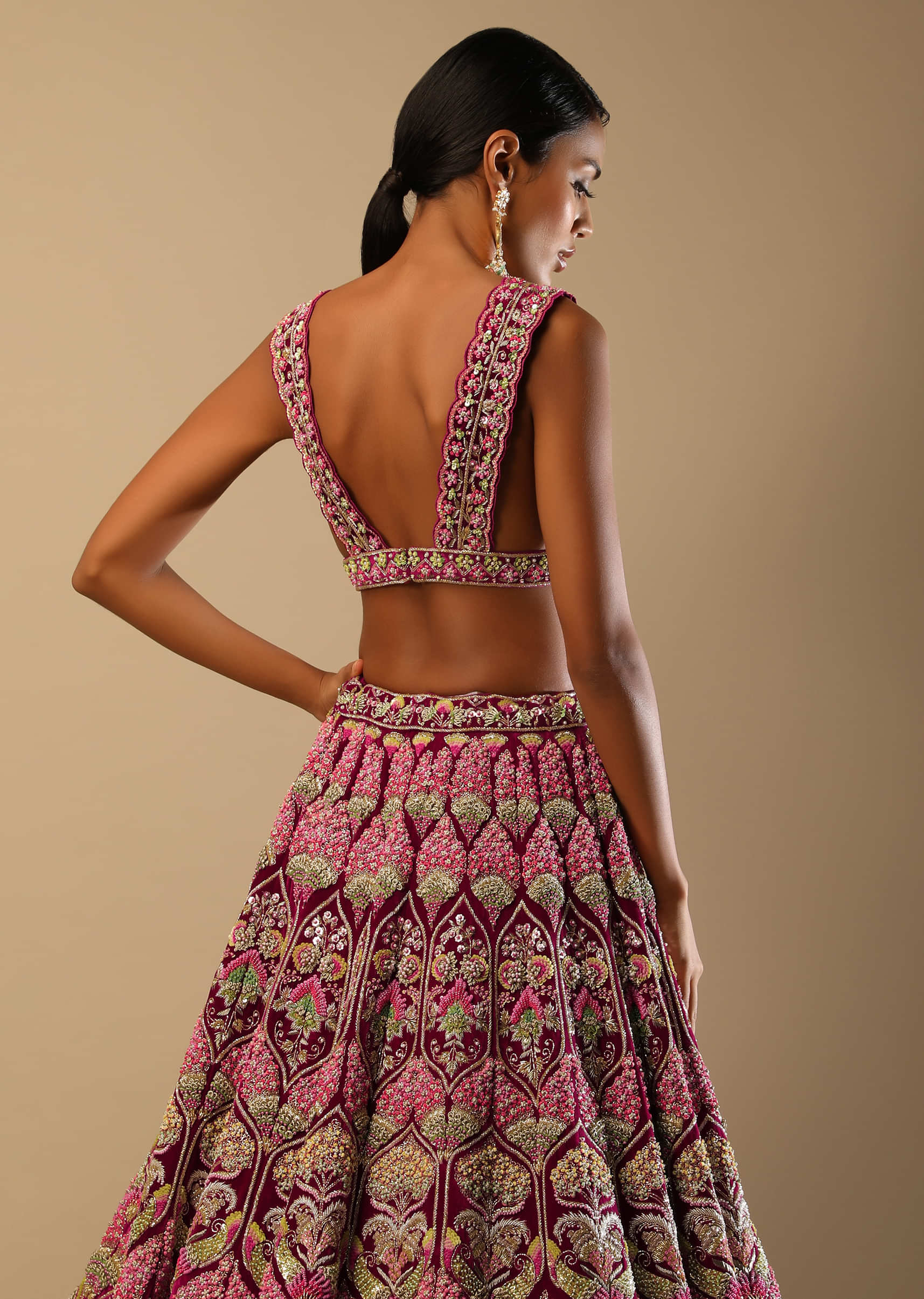Sangria Lehenga Choli In Velvet With Multi Colored Hand Embroidery In Intricate Moroccan And Floral Motifs 