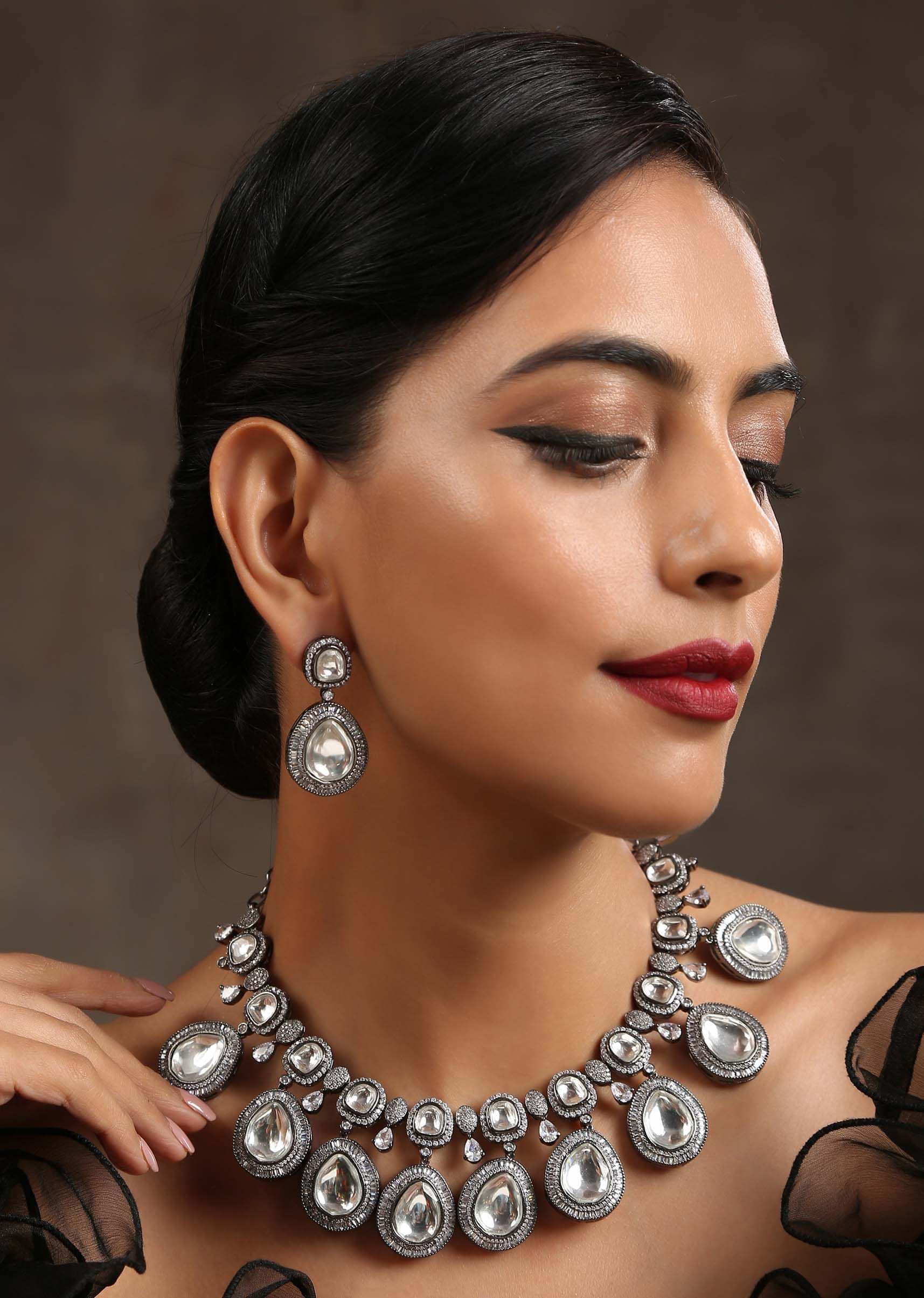 Silver Necklace With Kundan Polki In A Contemporary Design Along With Zirconia Stones