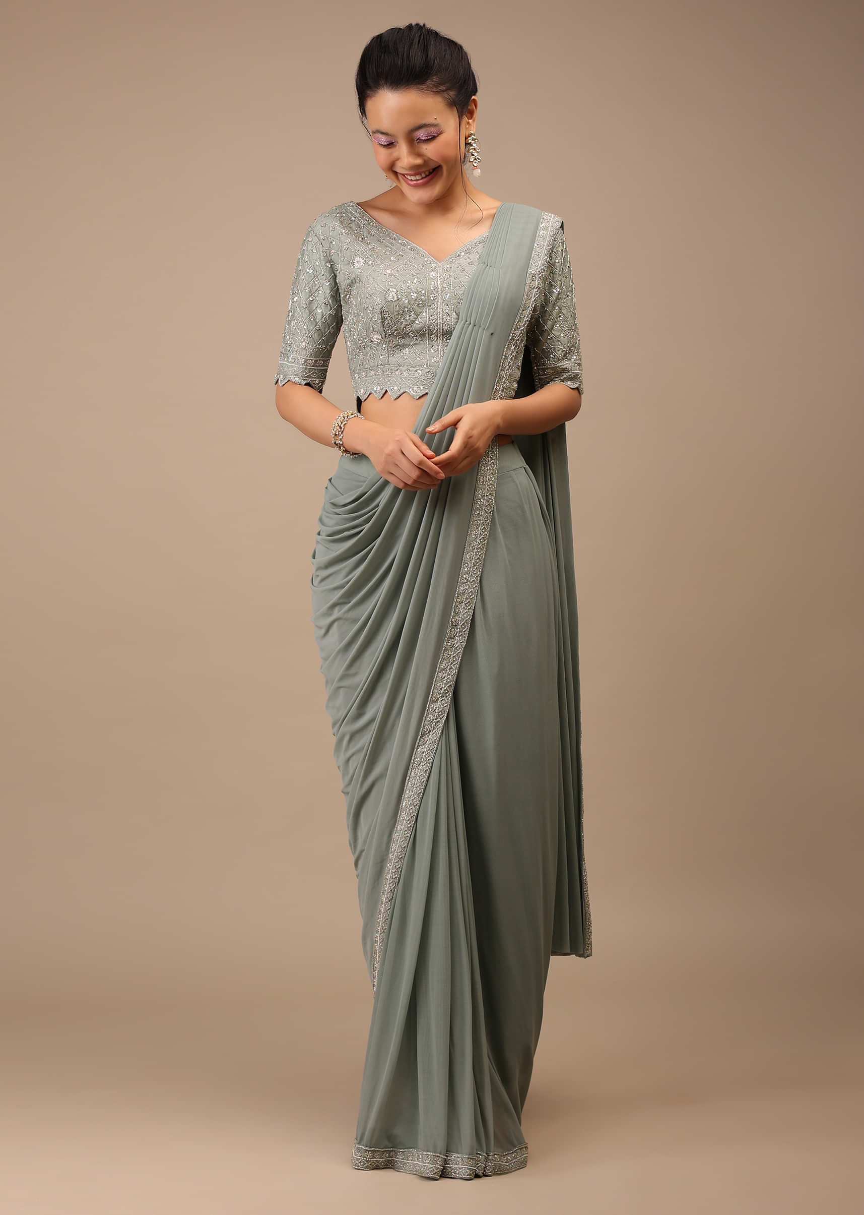Slate Grey Lycra Blend Saree Finished In A Moroccan Jaal  With Sequins Work And Cut Dana Floral Detailing 