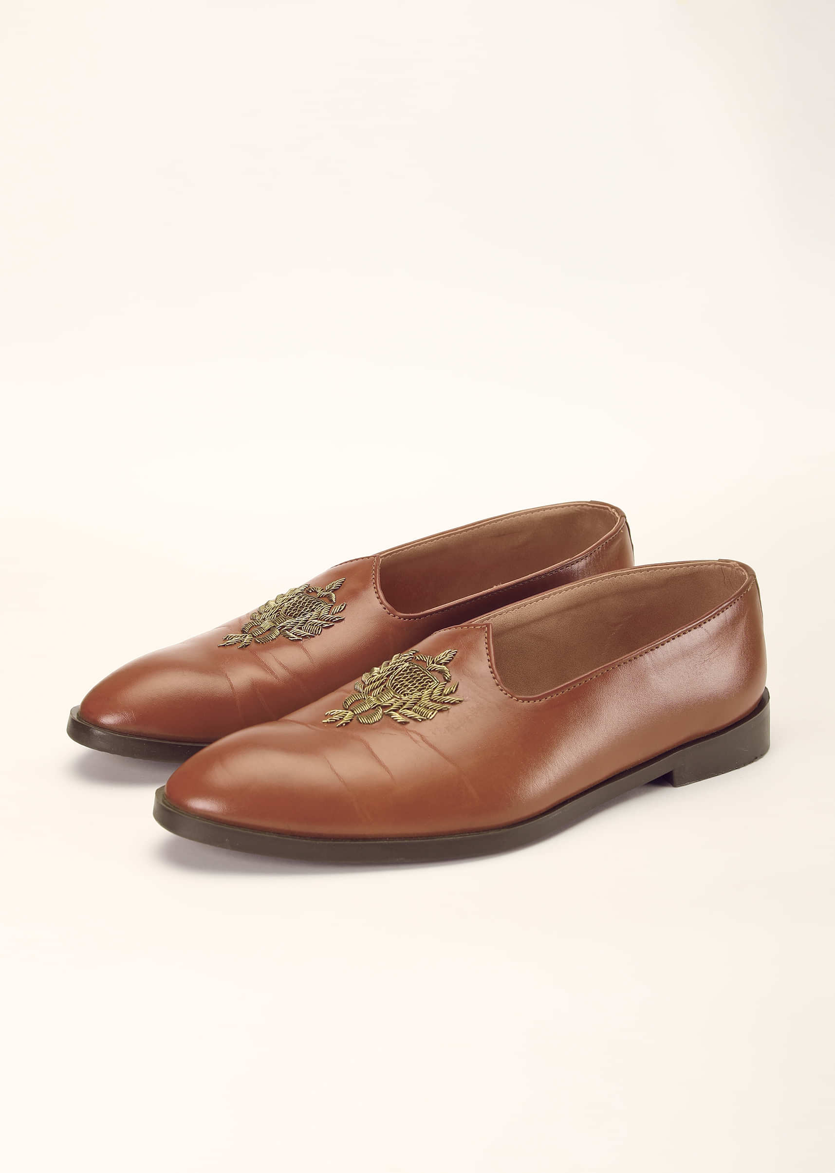 Tan Juttis In Leather With Zari Embroidered Motif