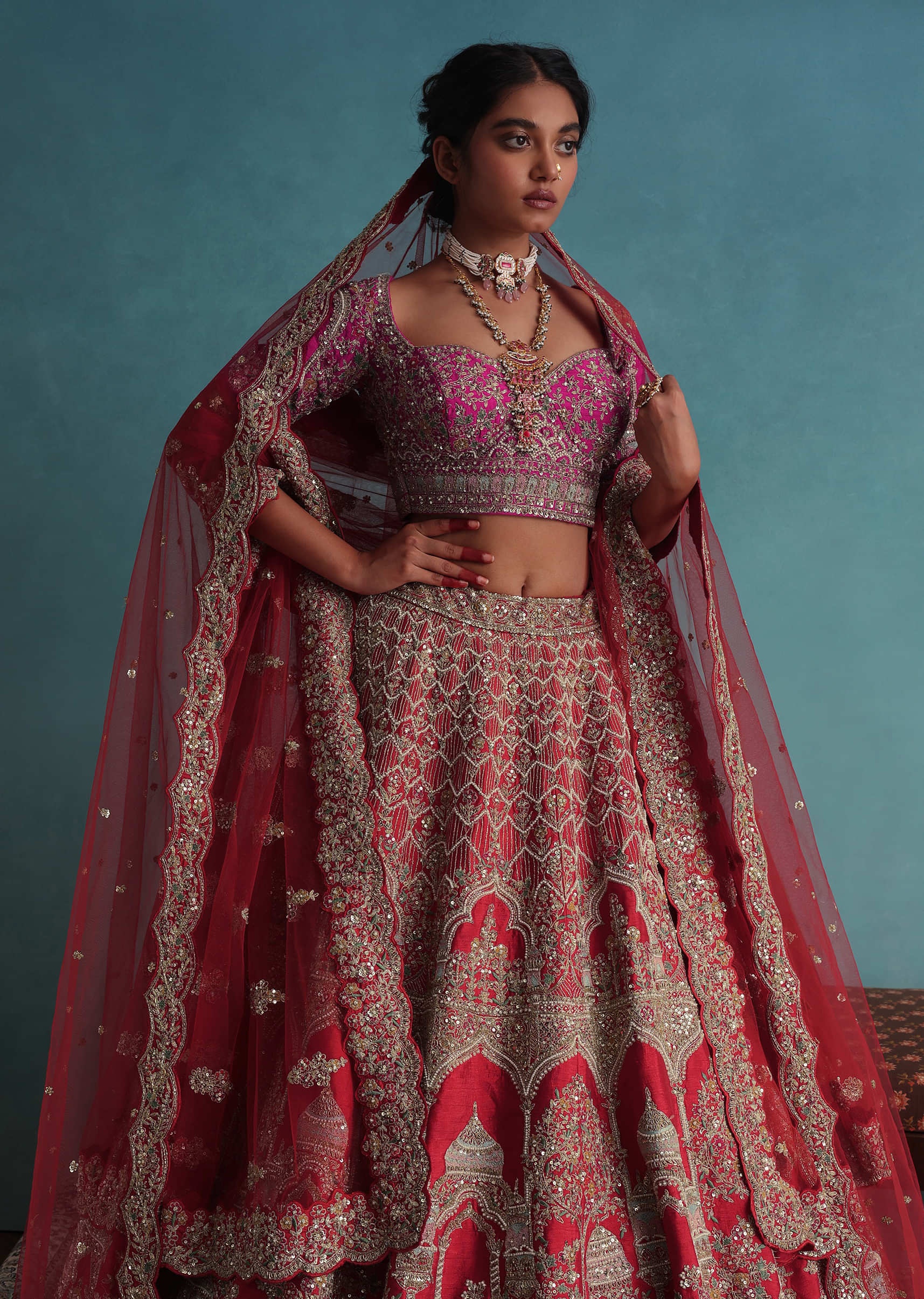 Tomato Red Embroidered 12 Kali Bridal Lehenga In Raw Silk With Cherry Pink Blouse And Veil Dupatta