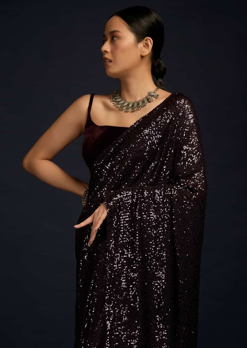 Wine Purple Ready Pleated Saree Embellished In Sequins And Matching Velvet Blouse With Straps On The Shoulder  