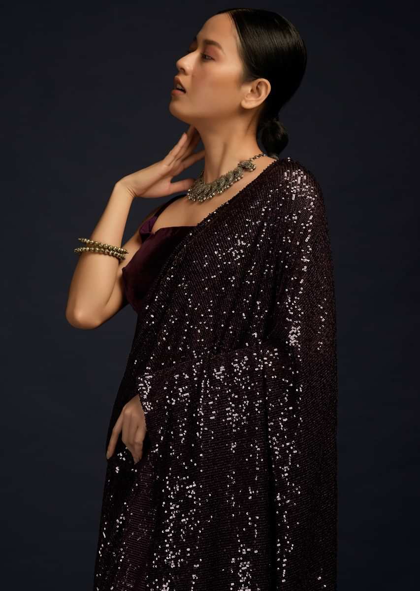 Wine Purple Ready Pleated Saree Embellished In Sequins And Matching Velvet Blouse With Straps On The Shoulder  